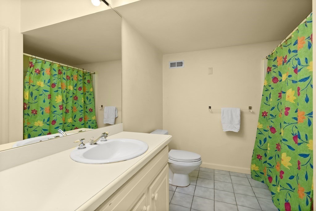 26 Fox Run Road Sudbury, MA 01776 - Photo 33 of 42 a bathroom with a sink and a mirror