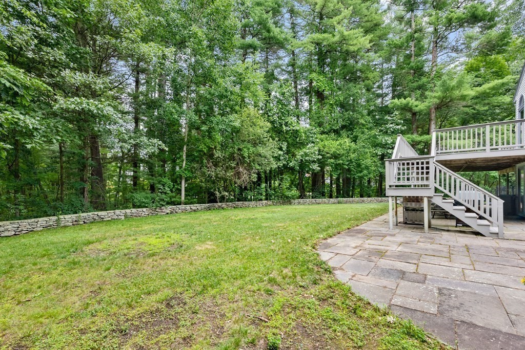 26 Fox Run Road Sudbury, MA 01776 - Photo 37 of 42 a view of a chair and table in the garden