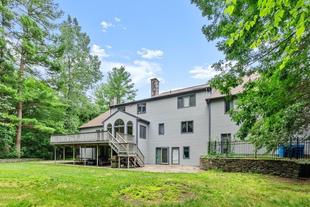 26 Fox Run Road Sudbury, MA 01776 - Photo 38 of 42 a front view of a house with a yard