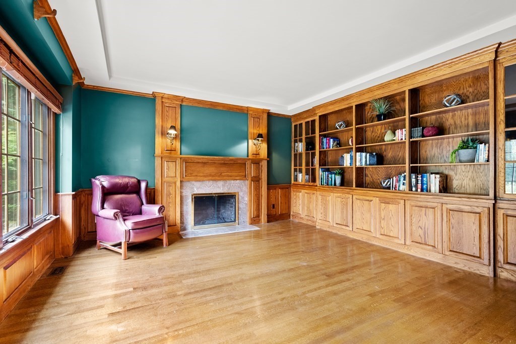 26 Fox Run Road Sudbury, MA 01776 - Photo 4 of 42 a living room with furniture cabinets and a fireplace