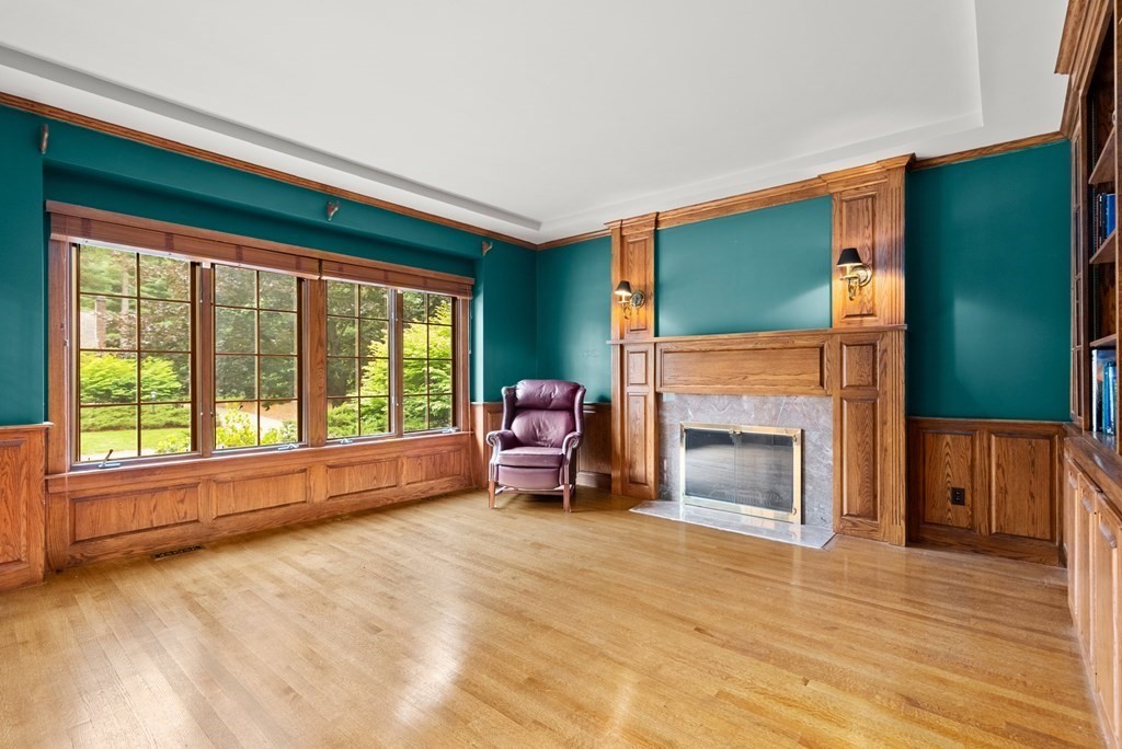 26 Fox Run Road Sudbury, MA 01776 - Photo 5 of 42 a living room with furniture and a fireplace
