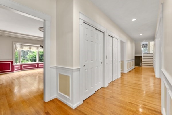 26 Fox Run Road Sudbury, MA 01776 - Photo 9 of 42 a view of a hallway with wooden floor and cabinet