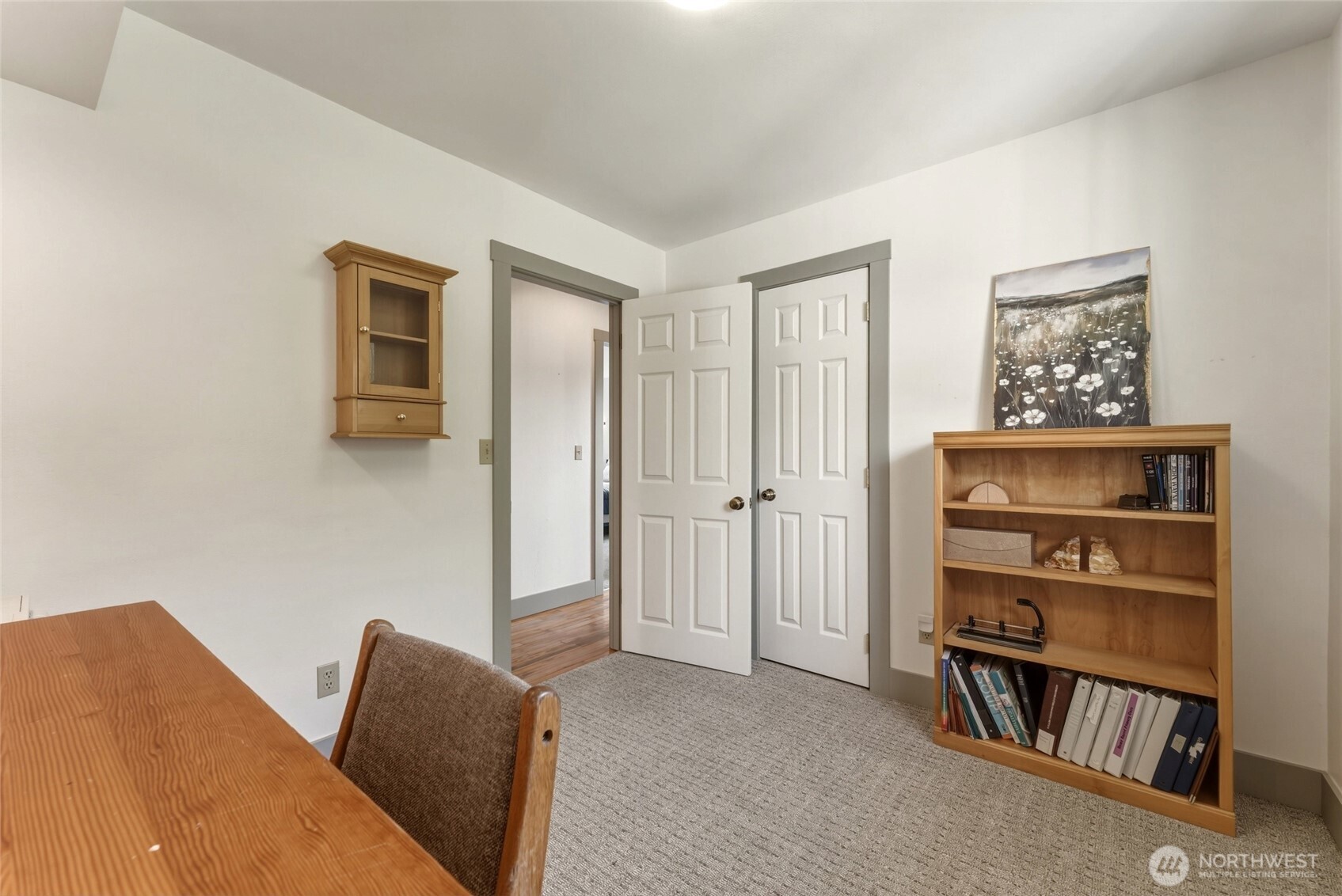 5834 Russell Creek Road Walla Walla, WA 99362 - Photo 26 of 38 a bedroom with a bed and a book shelf