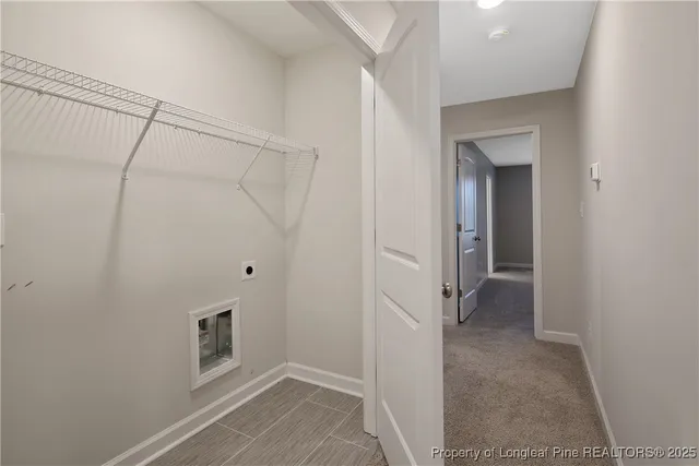 a view of a hallway with a white walls