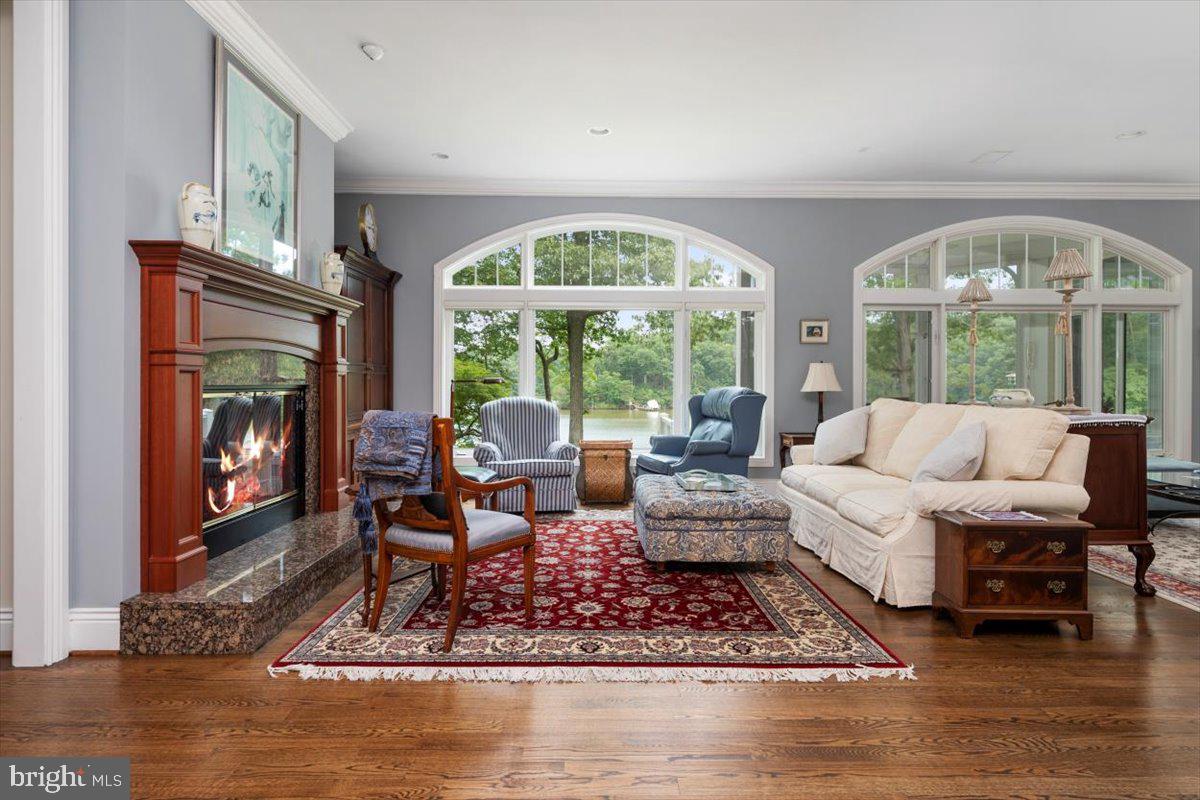3332 Breckenridge Way Riva, MD 21140 - Photo 12 of 50 a living room with furniture large window and a fireplace