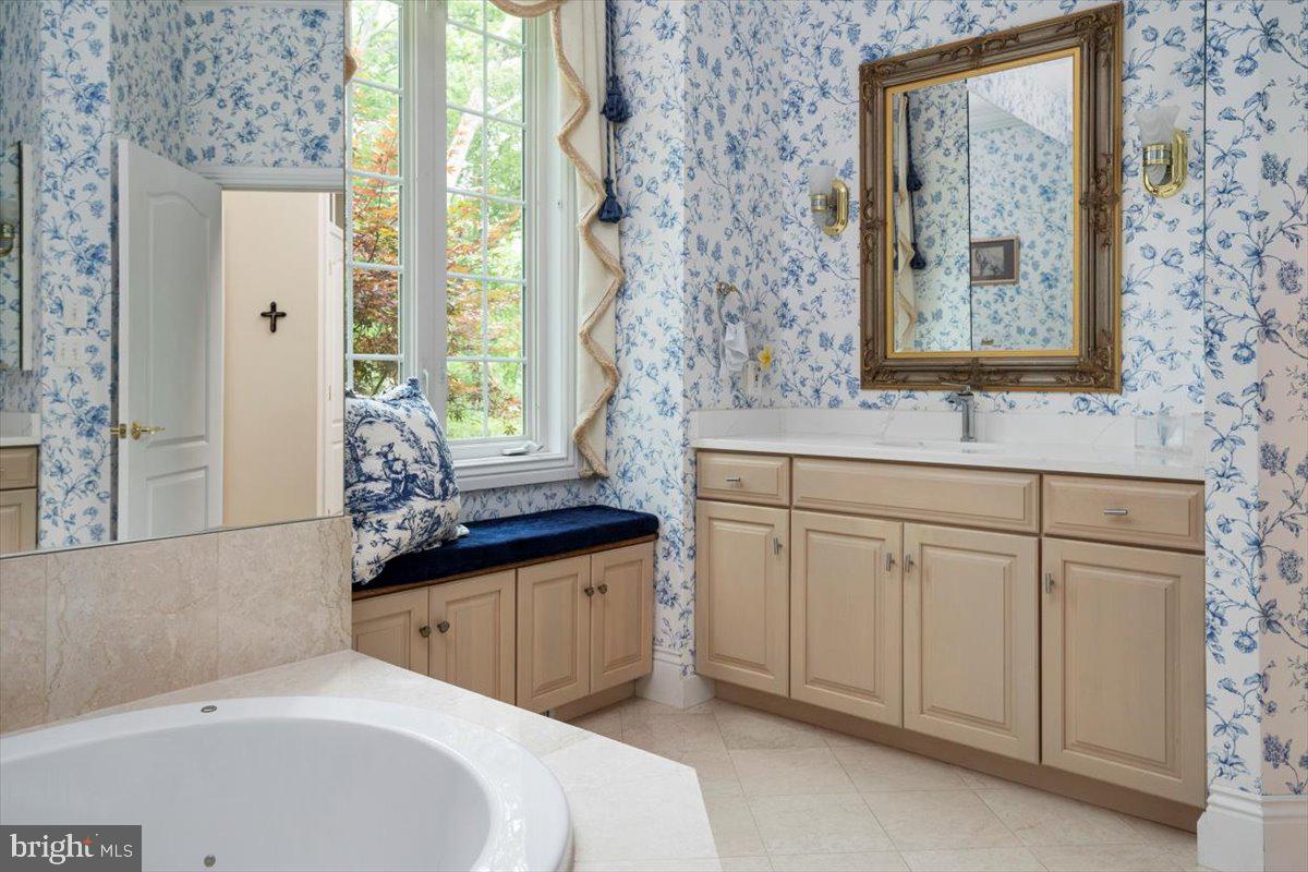 3332 Breckenridge Way Riva, MD 21140 - Photo 28 of 50 a bathroom with a sink and a mirror