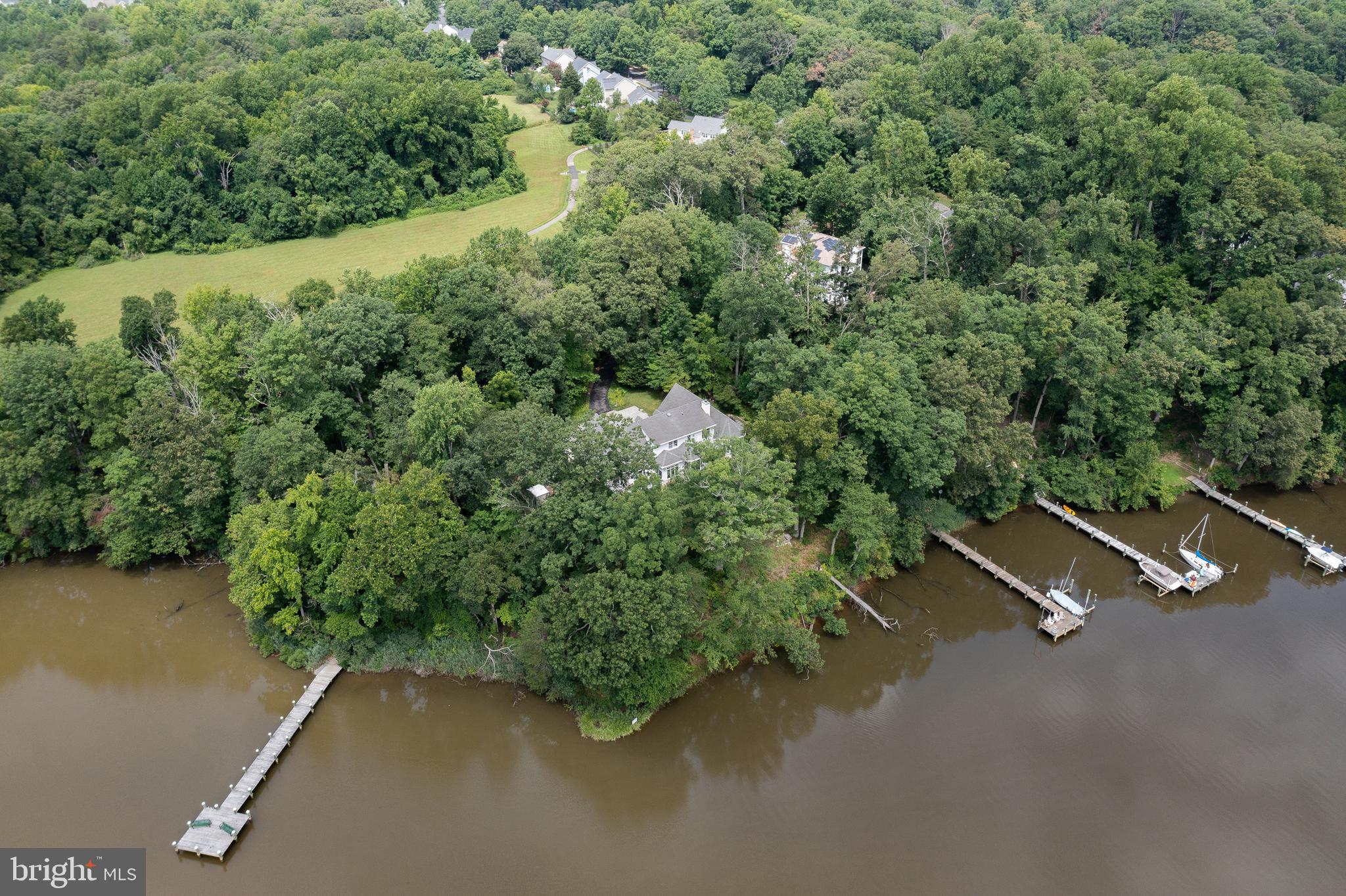 3332 Breckenridge Way Riva, MD 21140 - Photo 5 of 50 an aerial view of a house with a yard and lake view