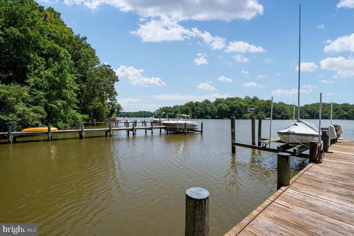 3332 Breckenridge Way Riva, MD 21140 - Photo 8 of 50 a view of a lake with boats and palm trees