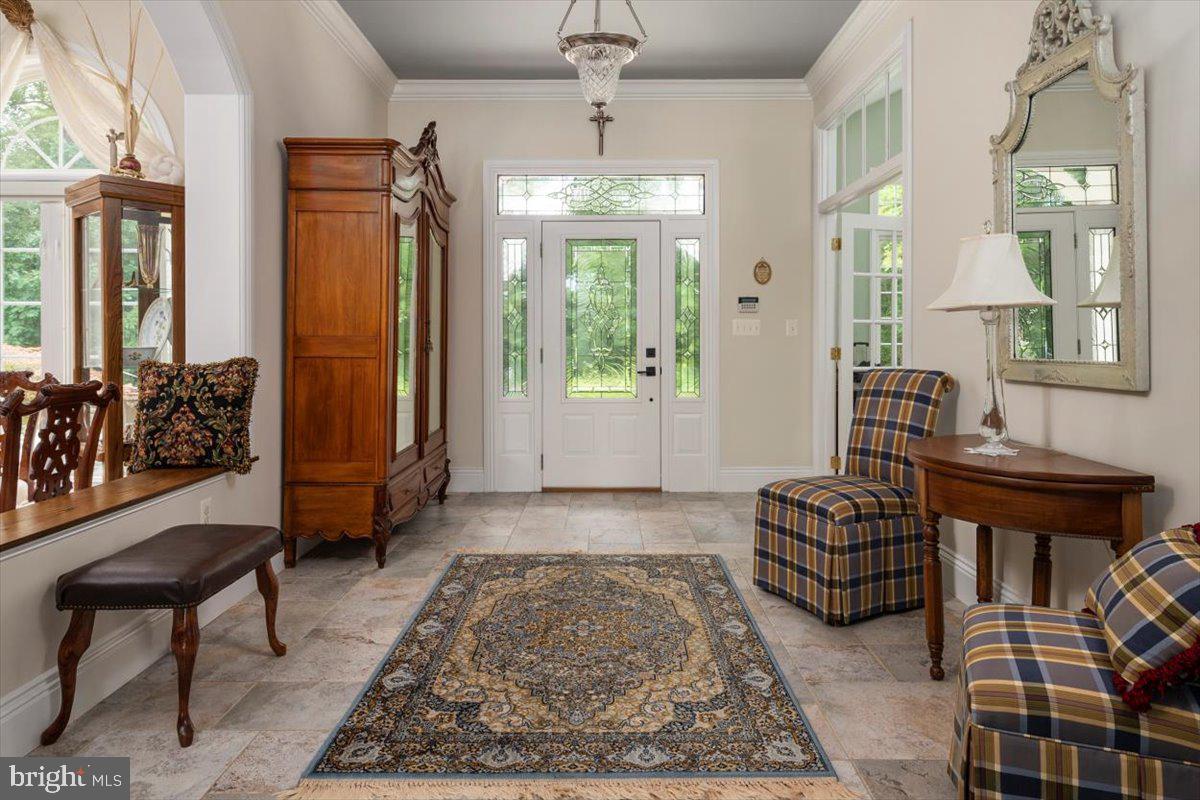 3332 Breckenridge Way Riva, MD 21140 - Photo 10 of 50 a living room with furniture and a chandelier