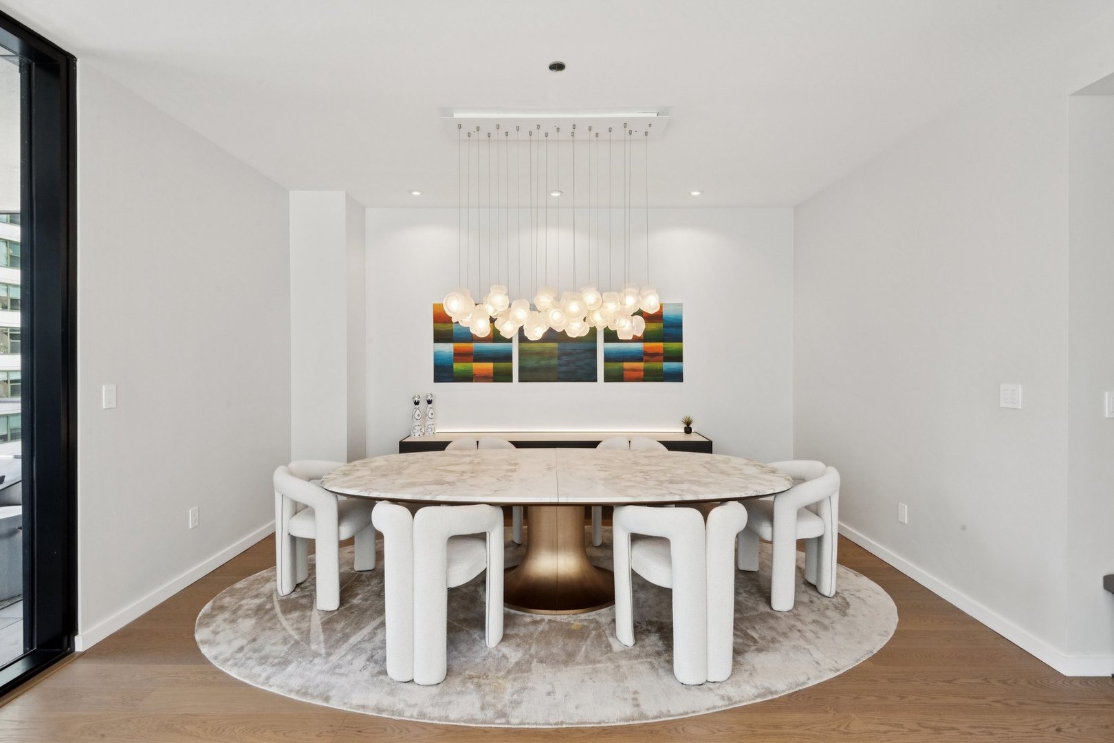 56 West Huron Street, Unit 9 Chicago, IL 60654 - Photo 14 of 38 a view of a dining room with furniture
