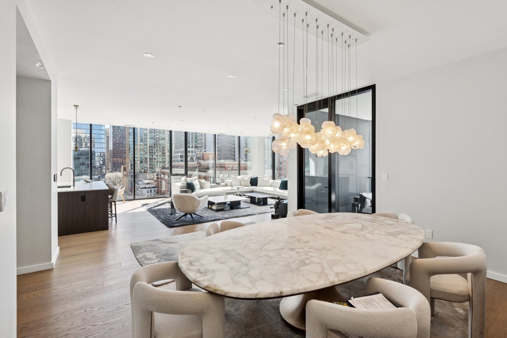 56 West Huron Street, Unit 9 Chicago, IL 60654 - Photo 15 of 38 a view of a dining room with furniture