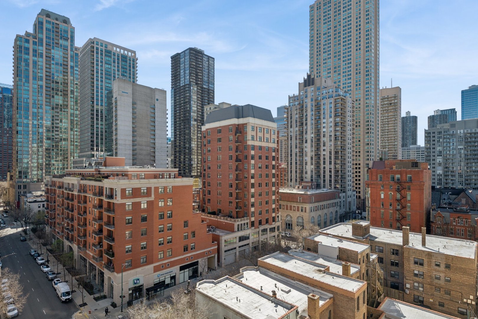 56 West Huron Street, Unit 9 Chicago, IL 60654 - Photo 17 of 38 a view of a city with tall buildings