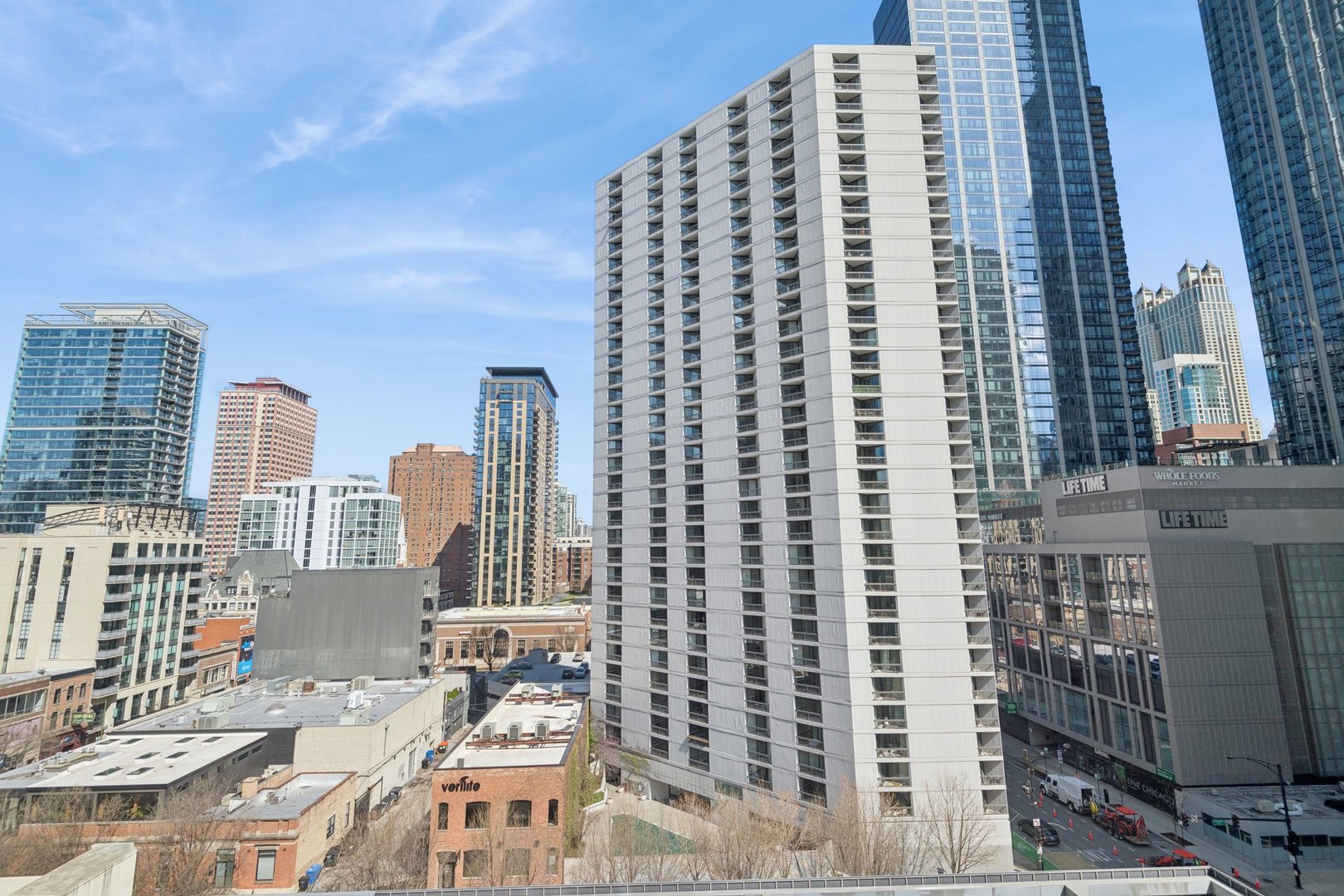 56 West Huron Street, Unit 9 Chicago, IL 60654 - Photo 21 of 38 a view of a city with tall buildings