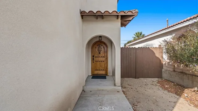 a view of a wooden door of a house