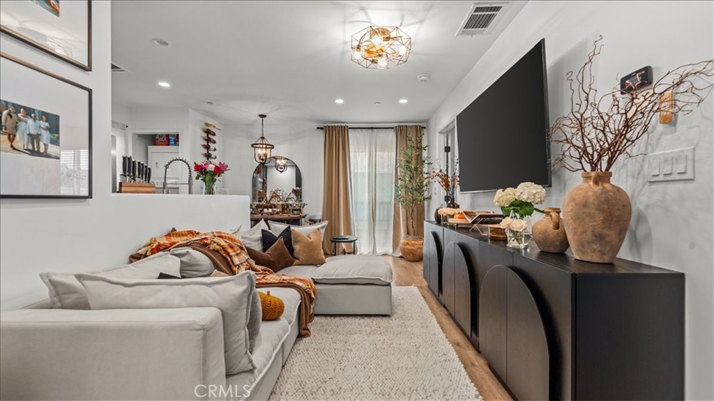 1475 North Holly Avenue Colton, CA 92324 - Photo 31 of 45 a living room with furniture and a rug