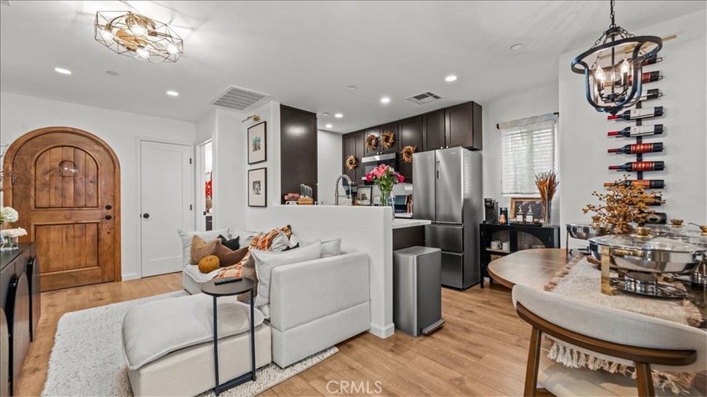 1475 North Holly Avenue Colton, CA 92324 - Photo 32 of 45 a living room with furniture and wooden floor