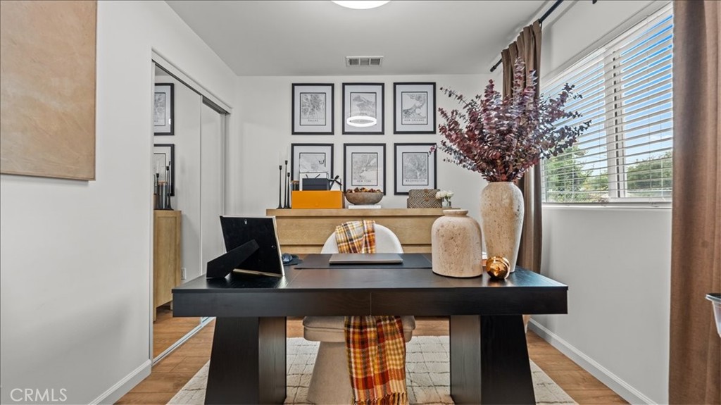 1475 North Holly Avenue Colton, CA 92324 - Photo 33 of 45 a view of a dining room with furniture and window