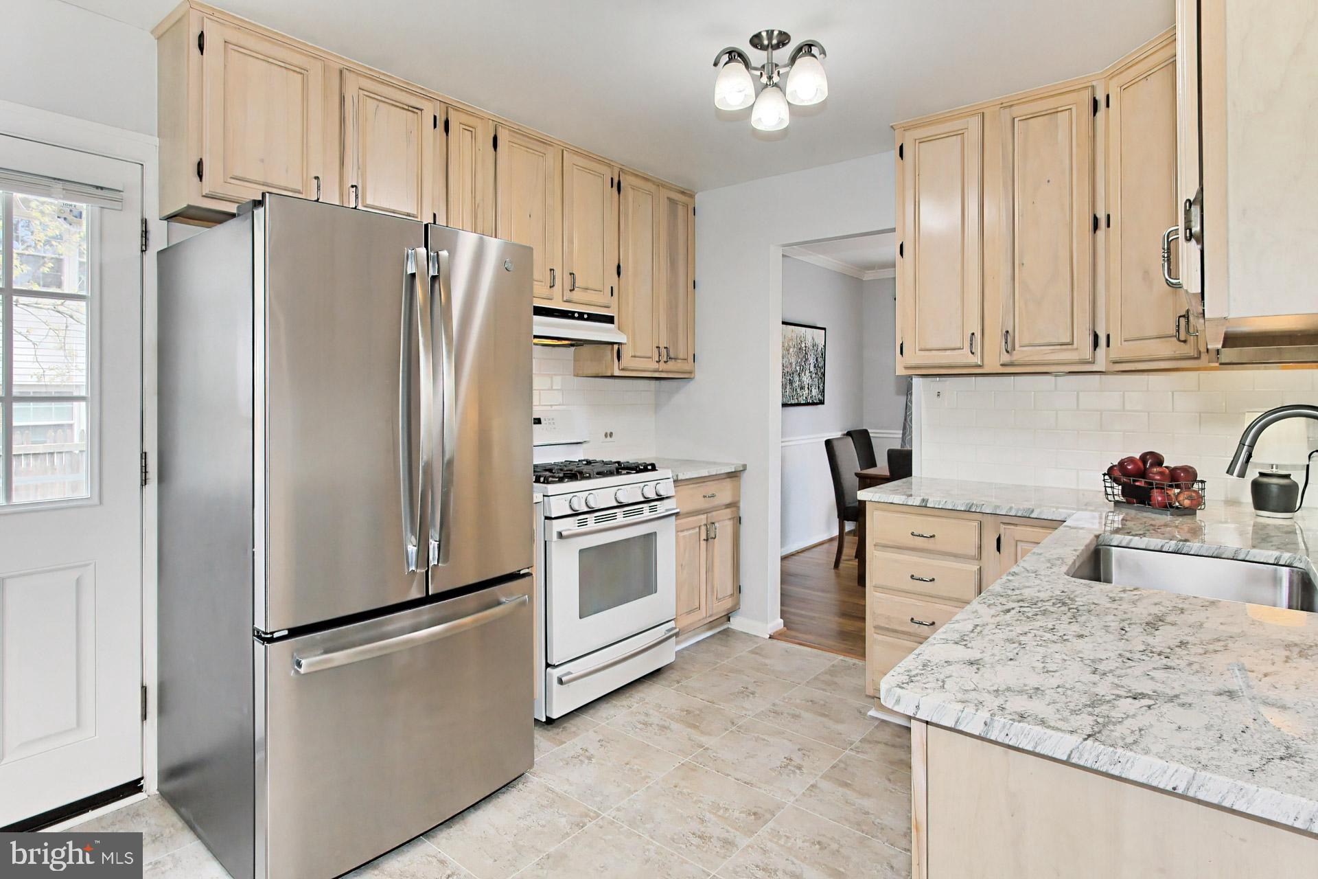 6011 Meriwether Lane Springfield, VA 22150 - Photo 15 of 53 A brand new stainless range just been installed