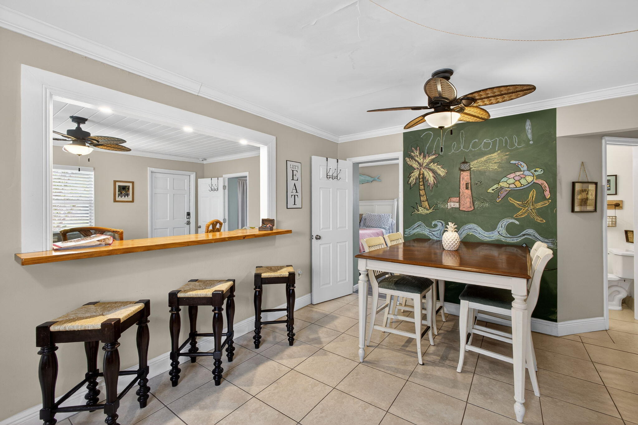 1901 Redbank Road North Palm Beach, FL 33408 - Photo 13 of 38 a dining room with furniture and window