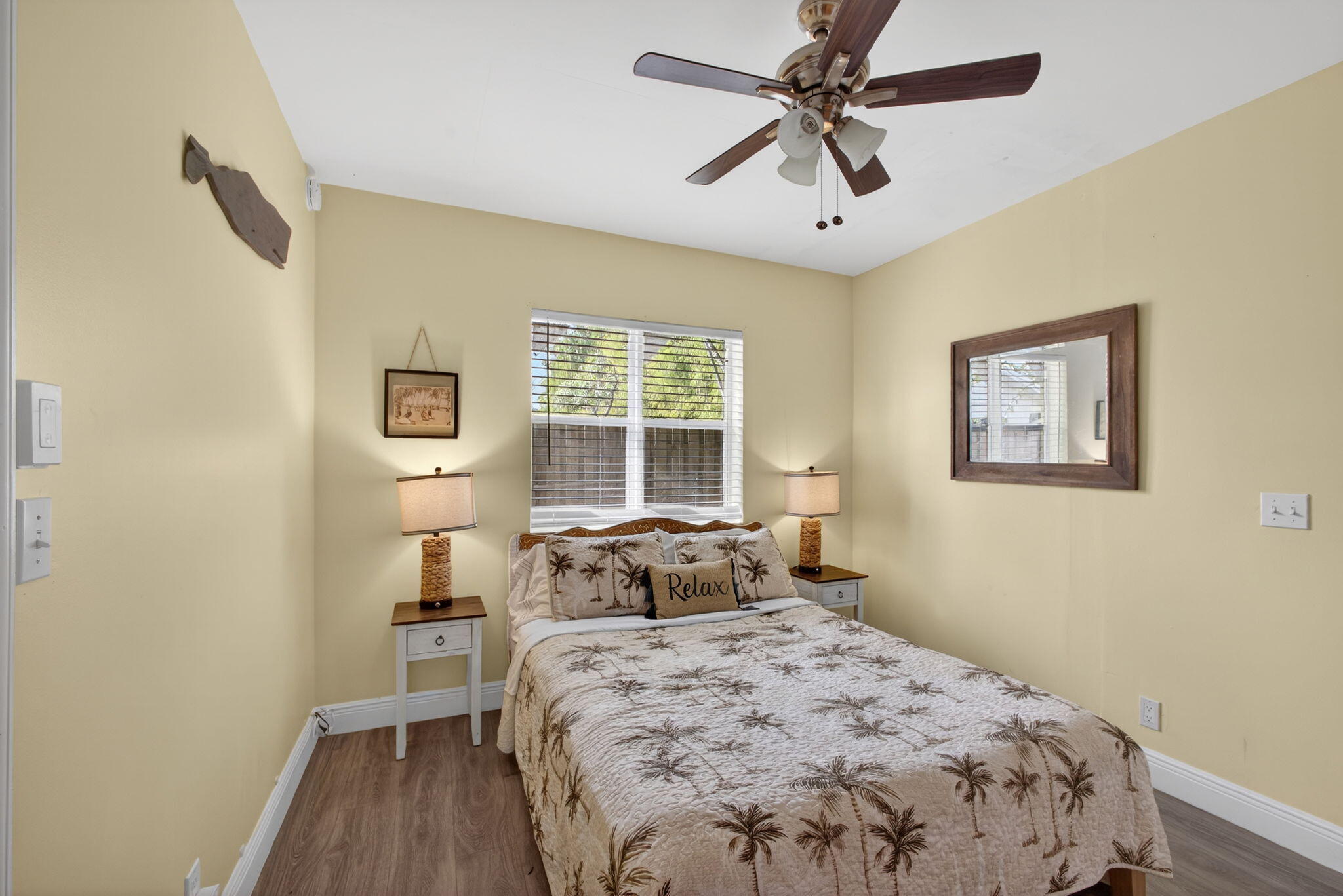 1901 Redbank Road North Palm Beach, FL 33408 - Photo 17 of 38 a bedroom with a bed and a window