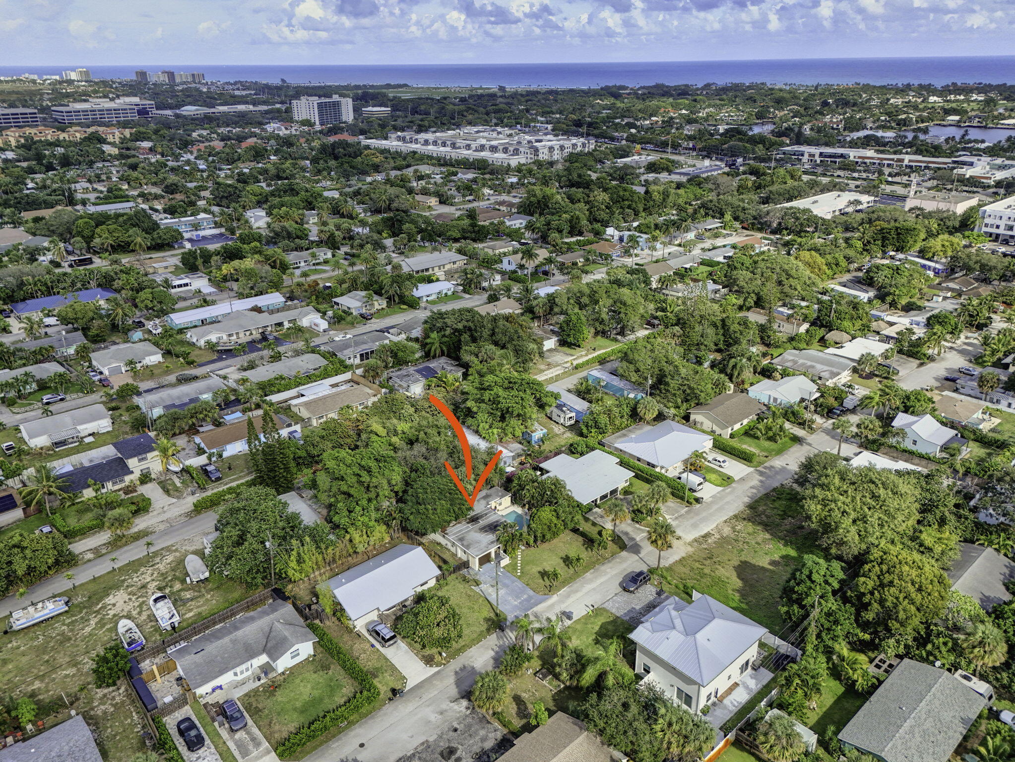 1901 Redbank Road North Palm Beach, FL 33408 - Photo 18 of 38 an aerial view of a city with lots of residential buildings