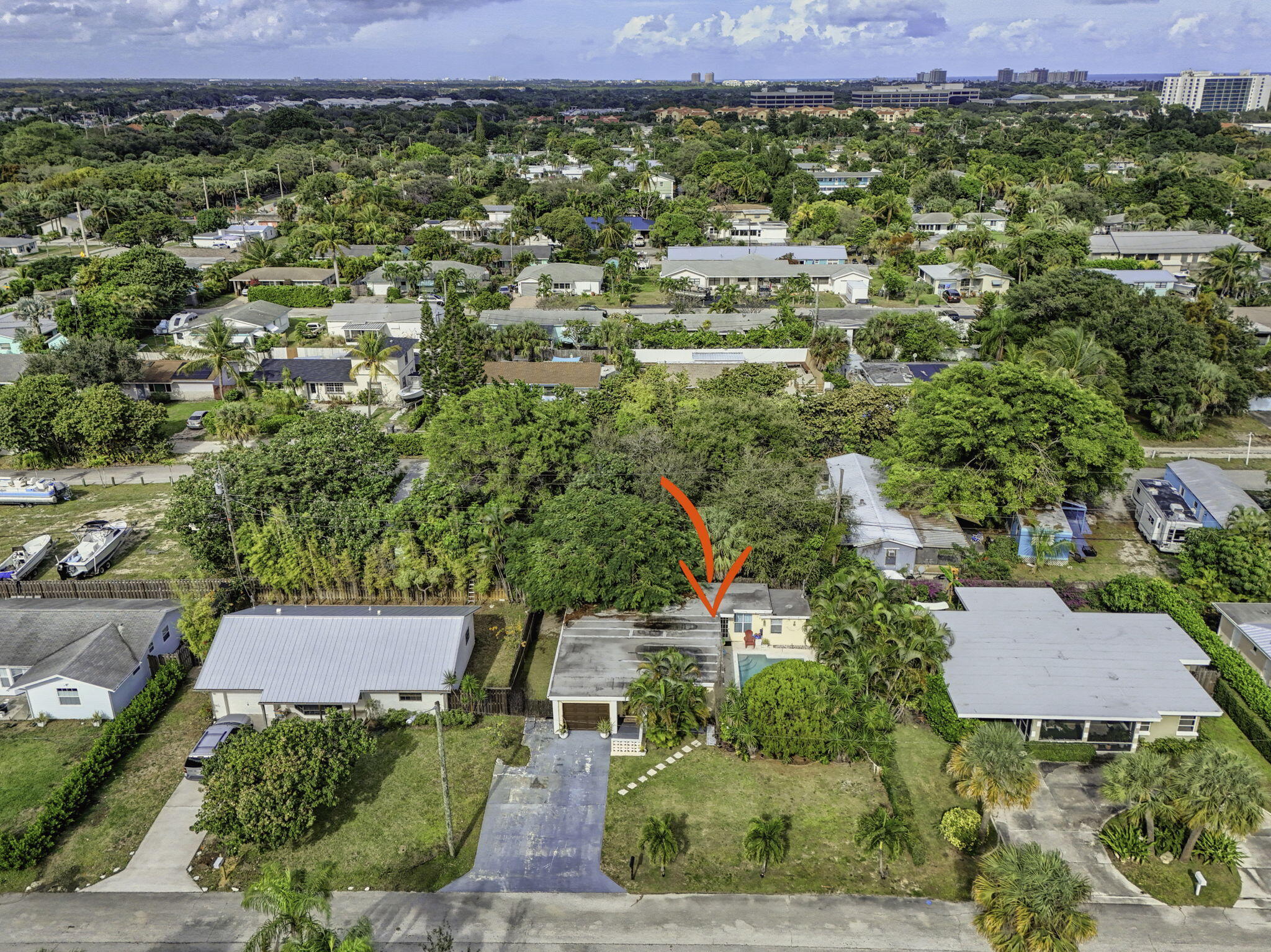 1901 Redbank Road North Palm Beach, FL 33408 - Photo 19 of 38 an aerial view of a house with a yard