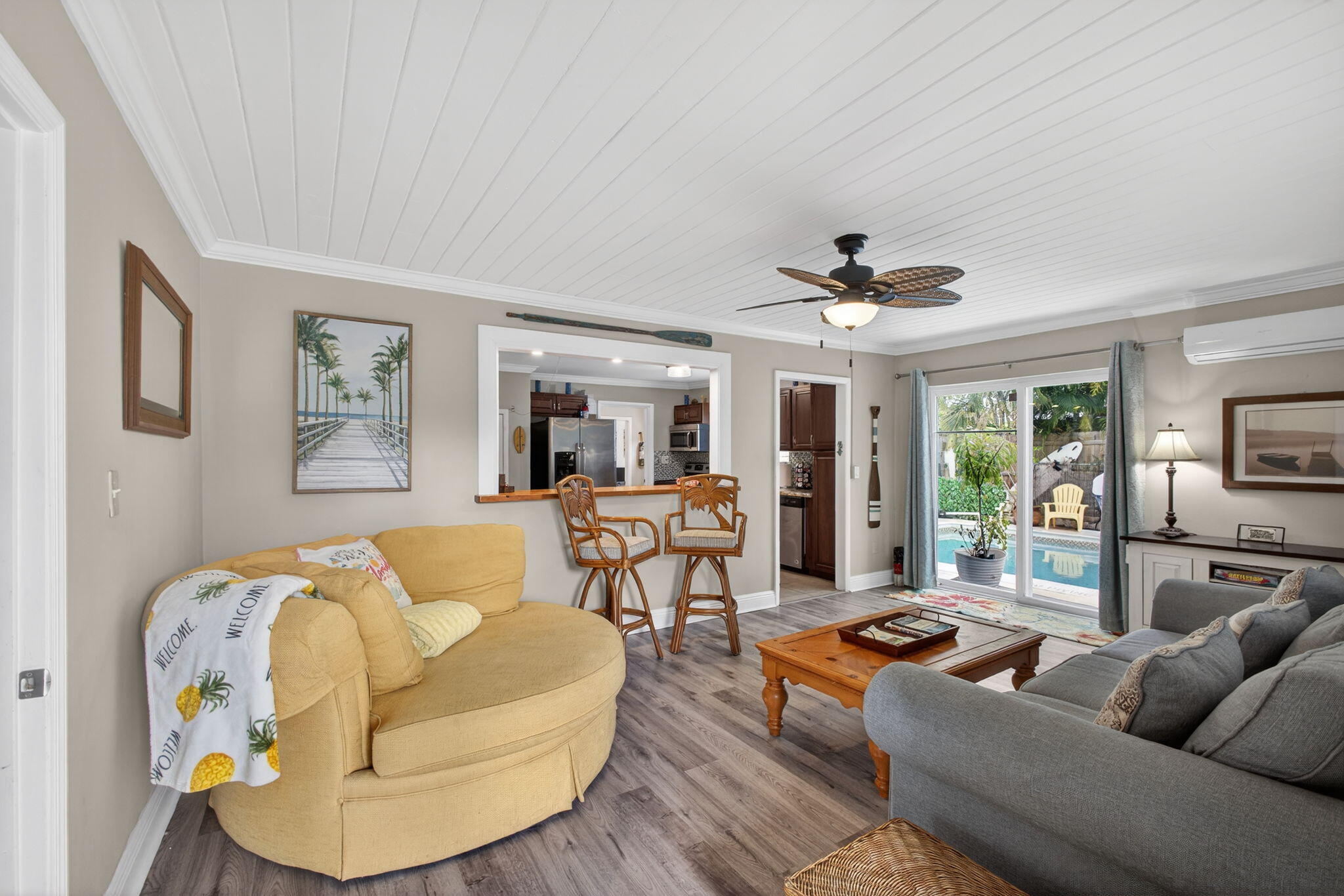 1901 Redbank Road North Palm Beach, FL 33408 - Photo 2 of 38 a living room with furniture and a large window