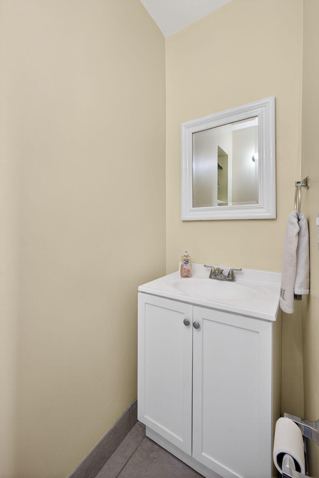 1901 Redbank Road North Palm Beach, FL 33408 - Photo 21 of 38 a bathroom with a sink toilet and mirror