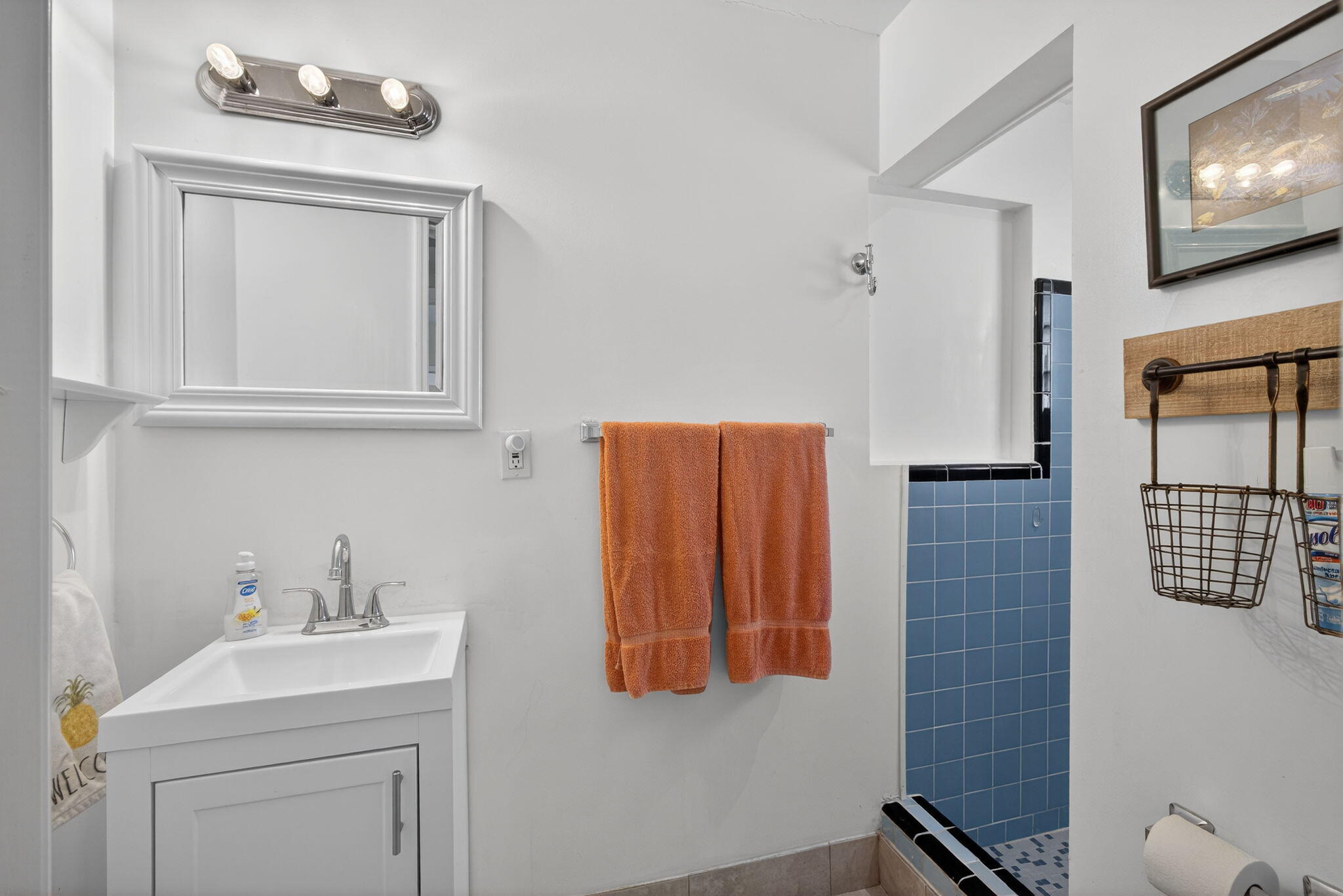 1901 Redbank Road North Palm Beach, FL 33408 - Photo 25 of 38 a bathroom with a sink a toilet and mirror