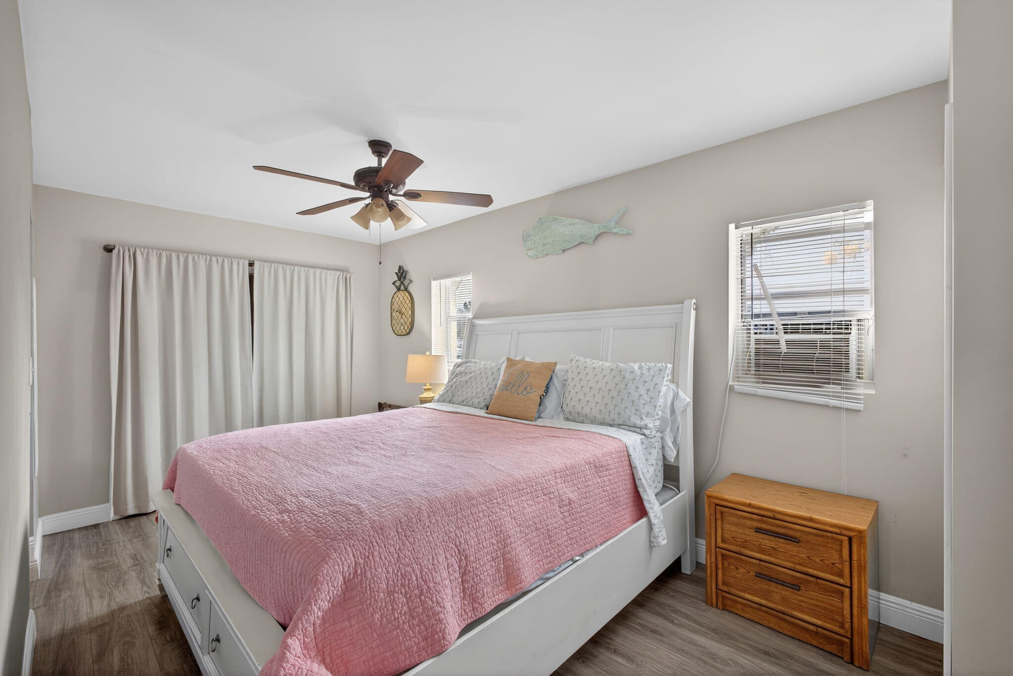 1901 Redbank Road North Palm Beach, FL 33408 - Photo 26 of 38 a bedroom with a bed and a chandelier