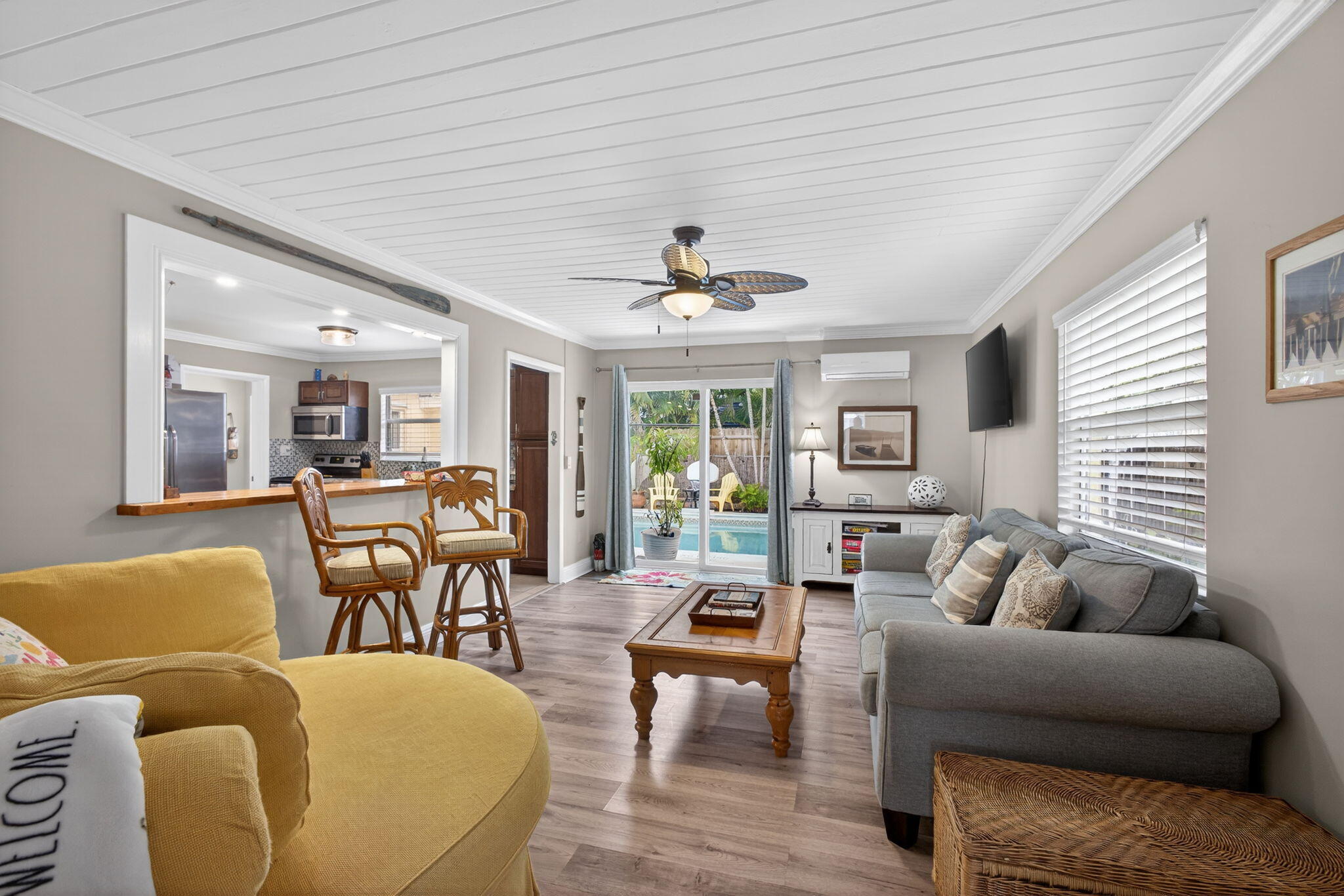 1901 Redbank Road North Palm Beach, FL 33408 - Photo 3 of 38 a living room with furniture and a large window