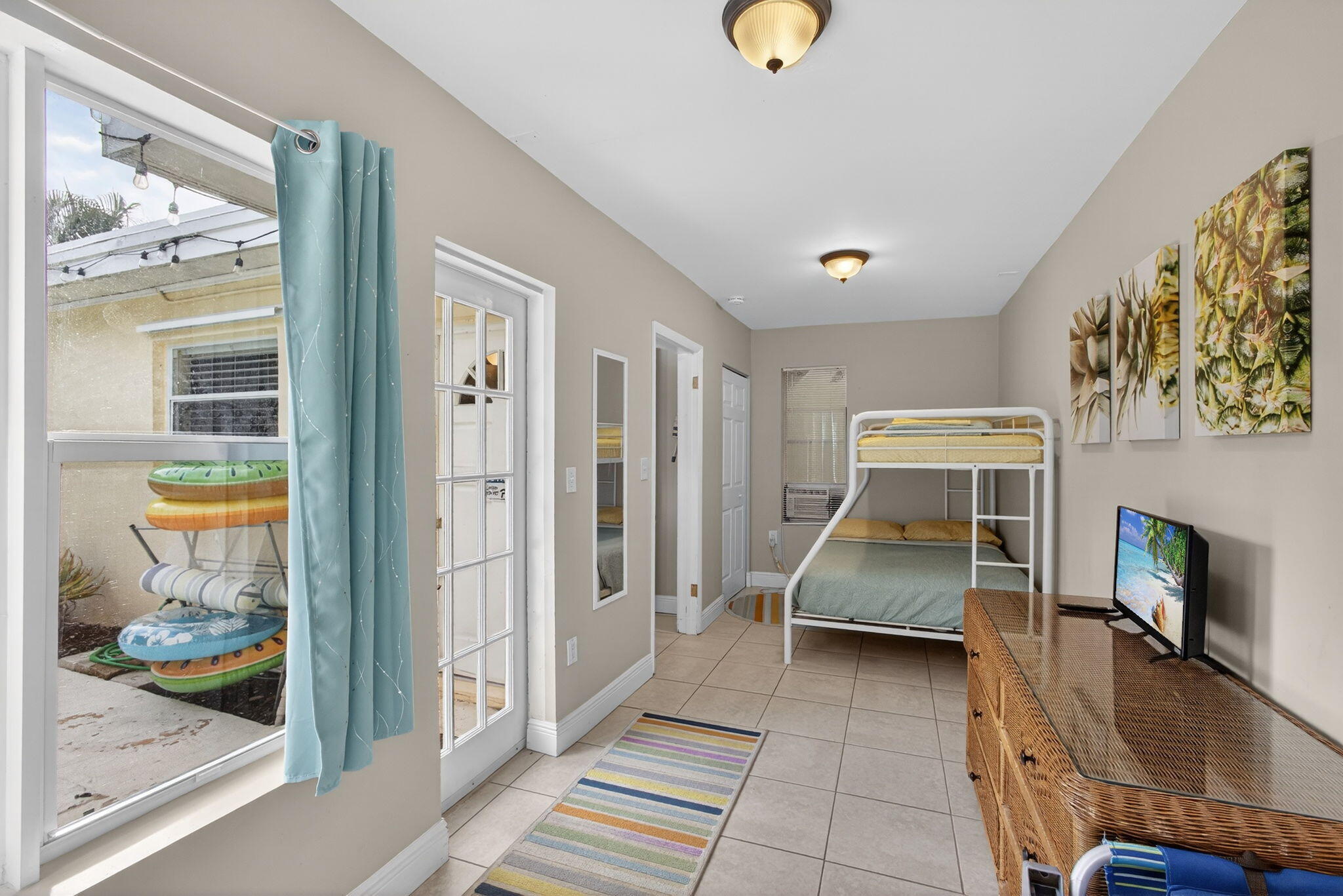 1901 Redbank Road North Palm Beach, FL 33408 - Photo 32 of 38 a view of a livingroom with furniture and front door