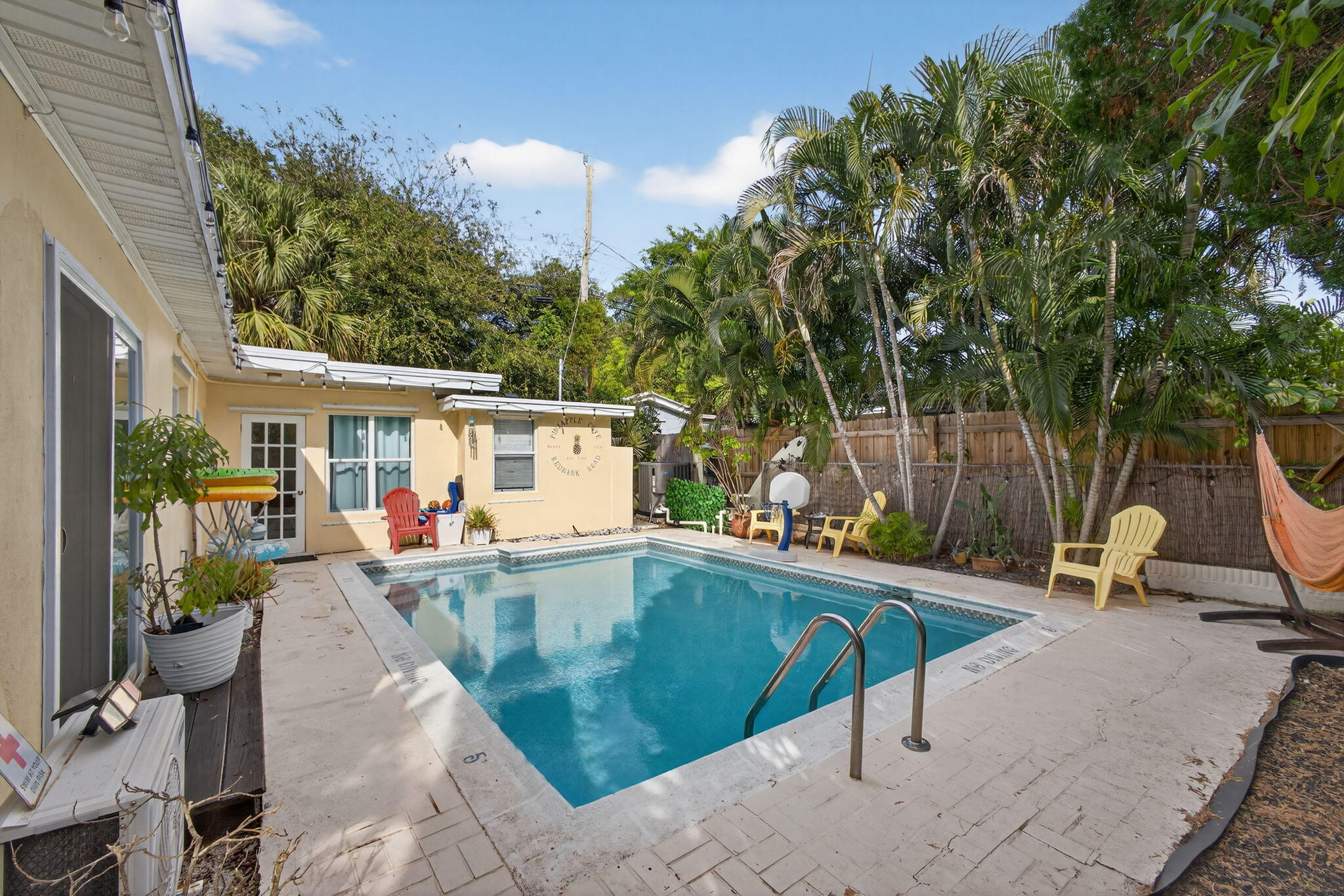 1901 Redbank Road North Palm Beach, FL 33408 - Photo 36 of 38 swimming pool view with a seating space