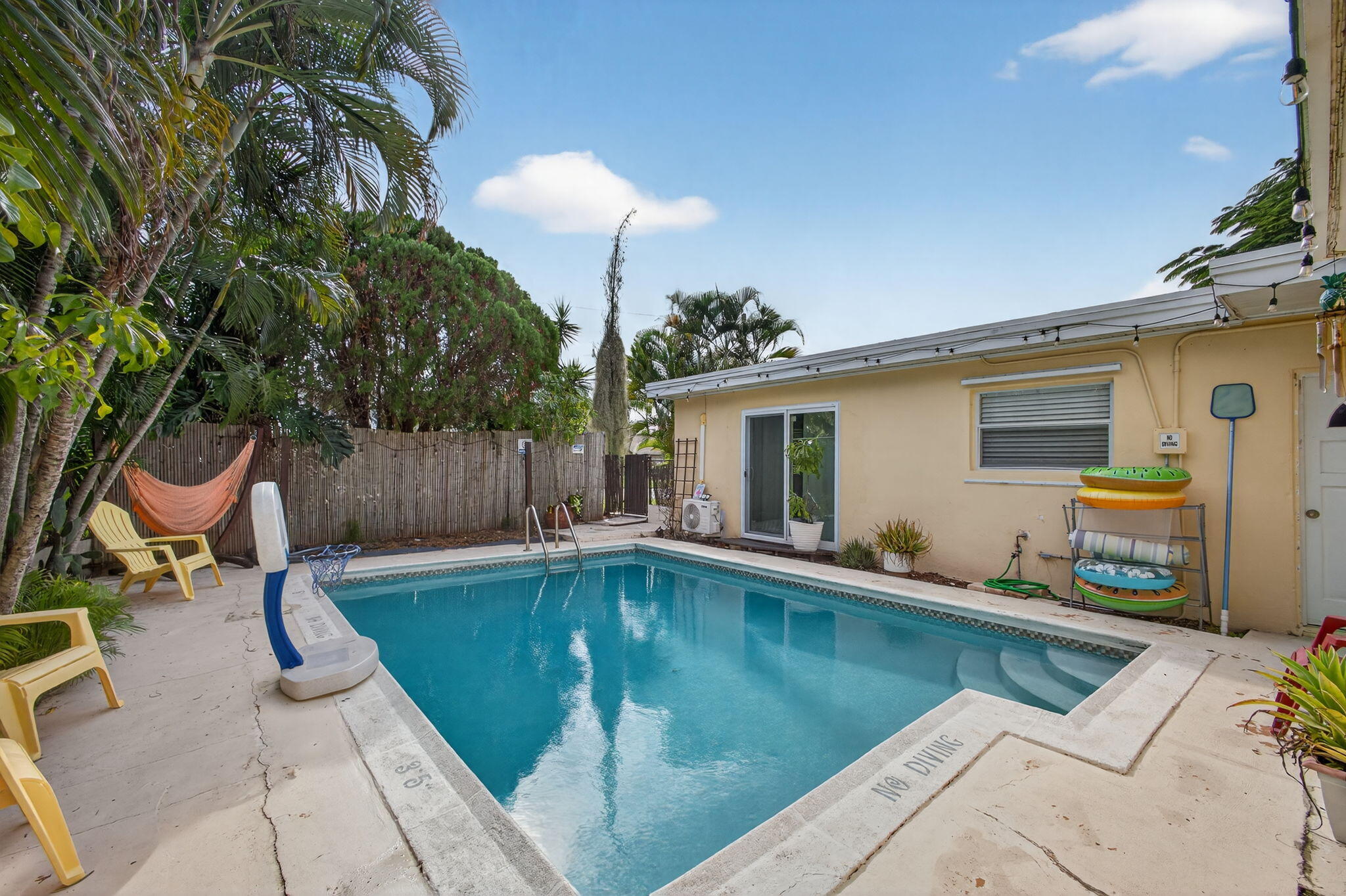 1901 Redbank Road North Palm Beach, FL 33408 - Photo 37 of 38 a swimming pool with outdoor seating yard and barbeque oven