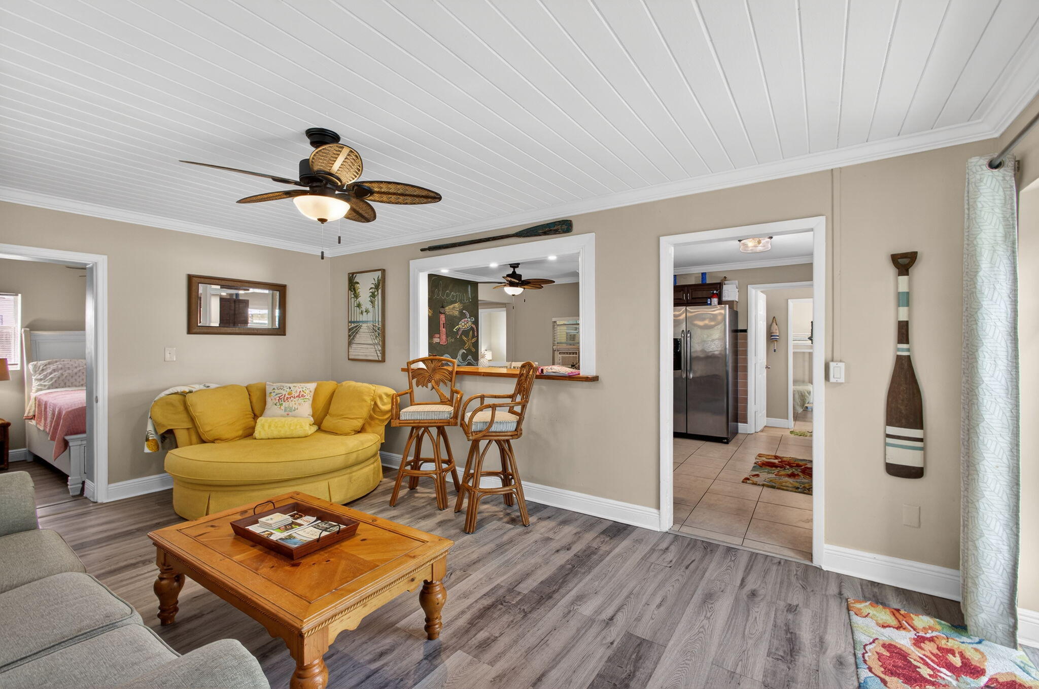 1901 Redbank Road North Palm Beach, FL 33408 - Photo 6 of 38 a living room with furniture and a wooden floor