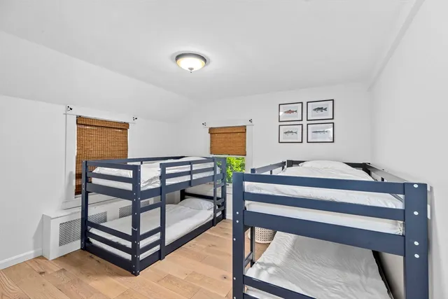 a view of a livingroom with furniture and a window