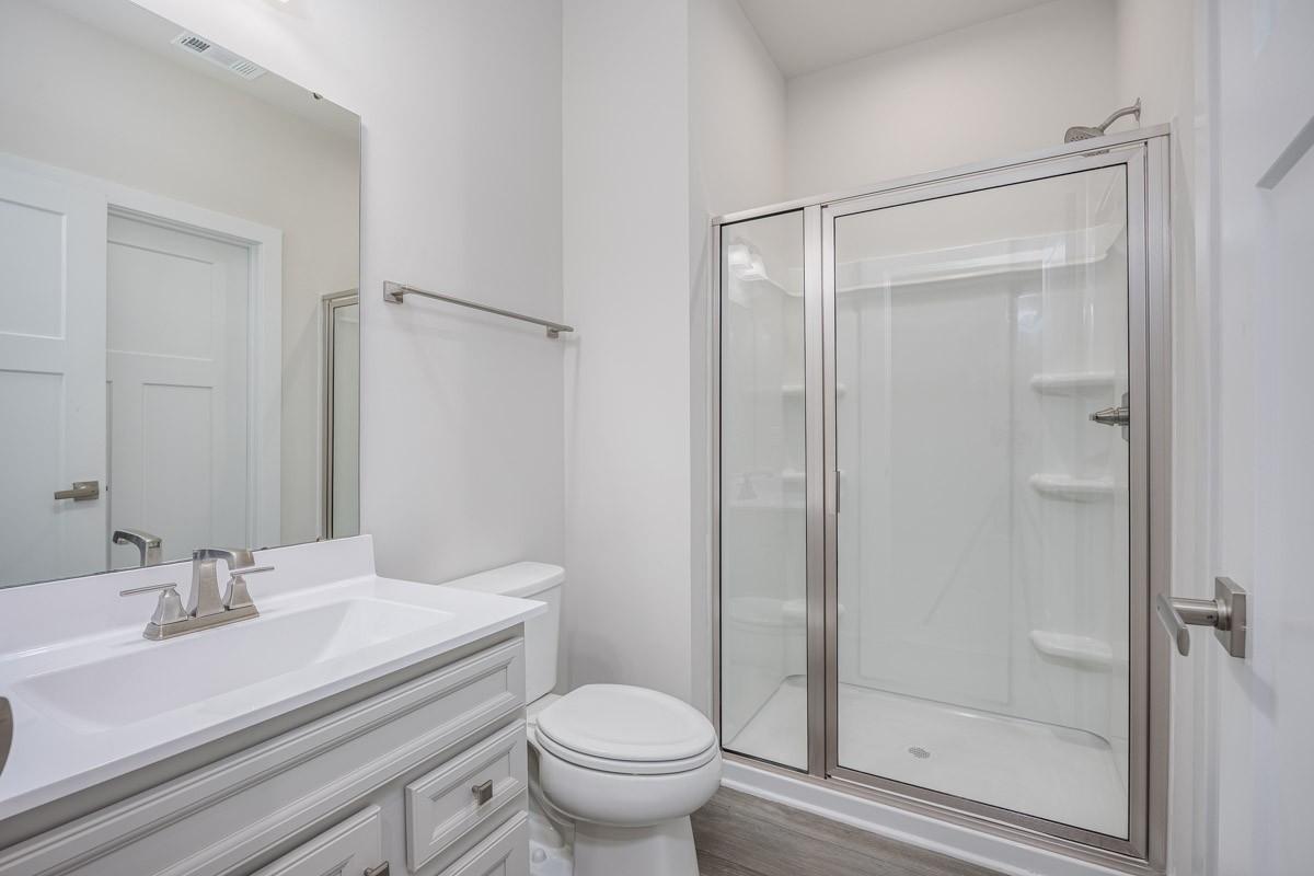 968 Caywood Road Smyrna, TN 37167 - Photo 25 of 54 a bathroom with a granite countertop sink toilet and shower