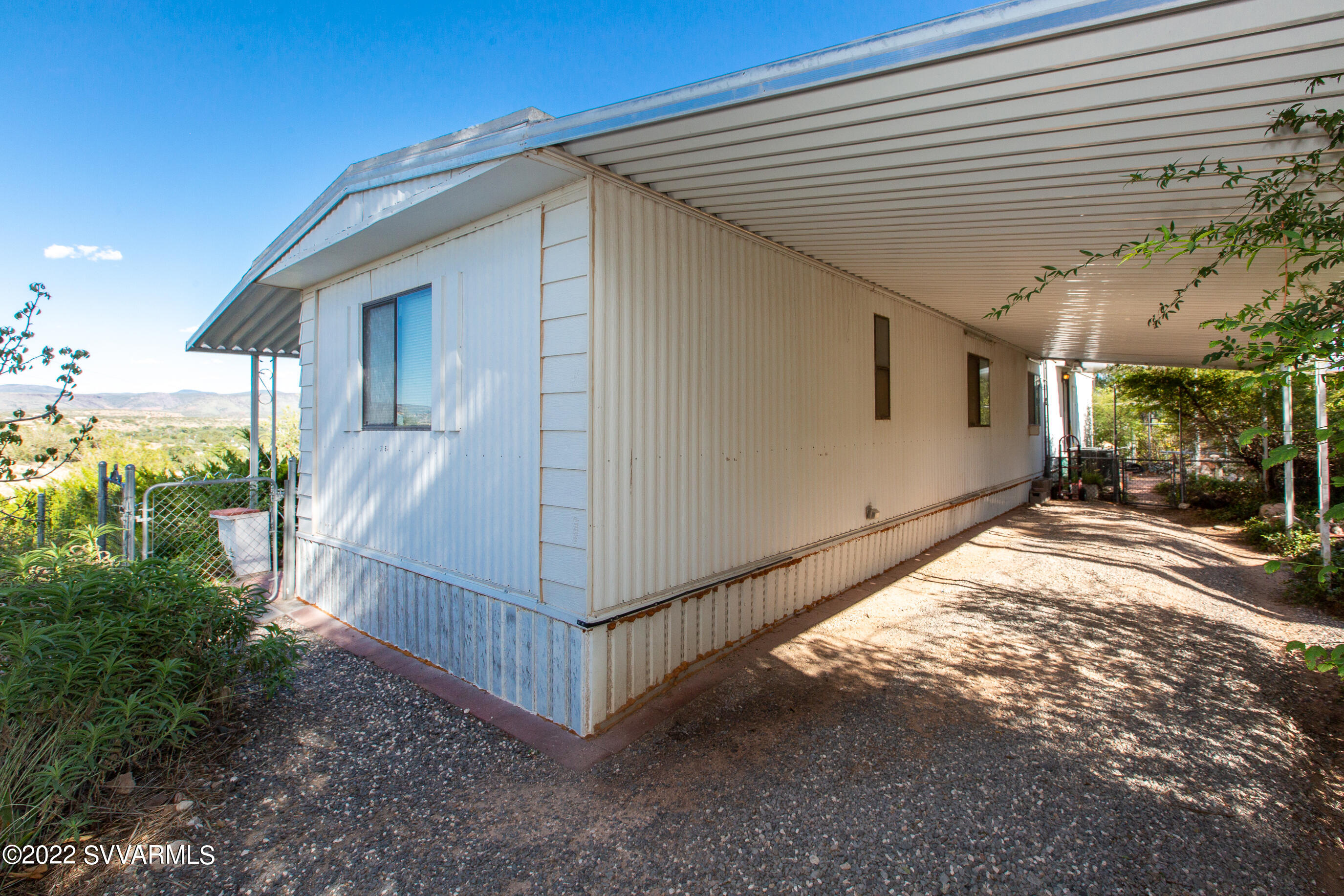 3765 East Valley Vista Road Rimrock, AZ 86335 - Photo 3 of 20 a view of a house with a yard