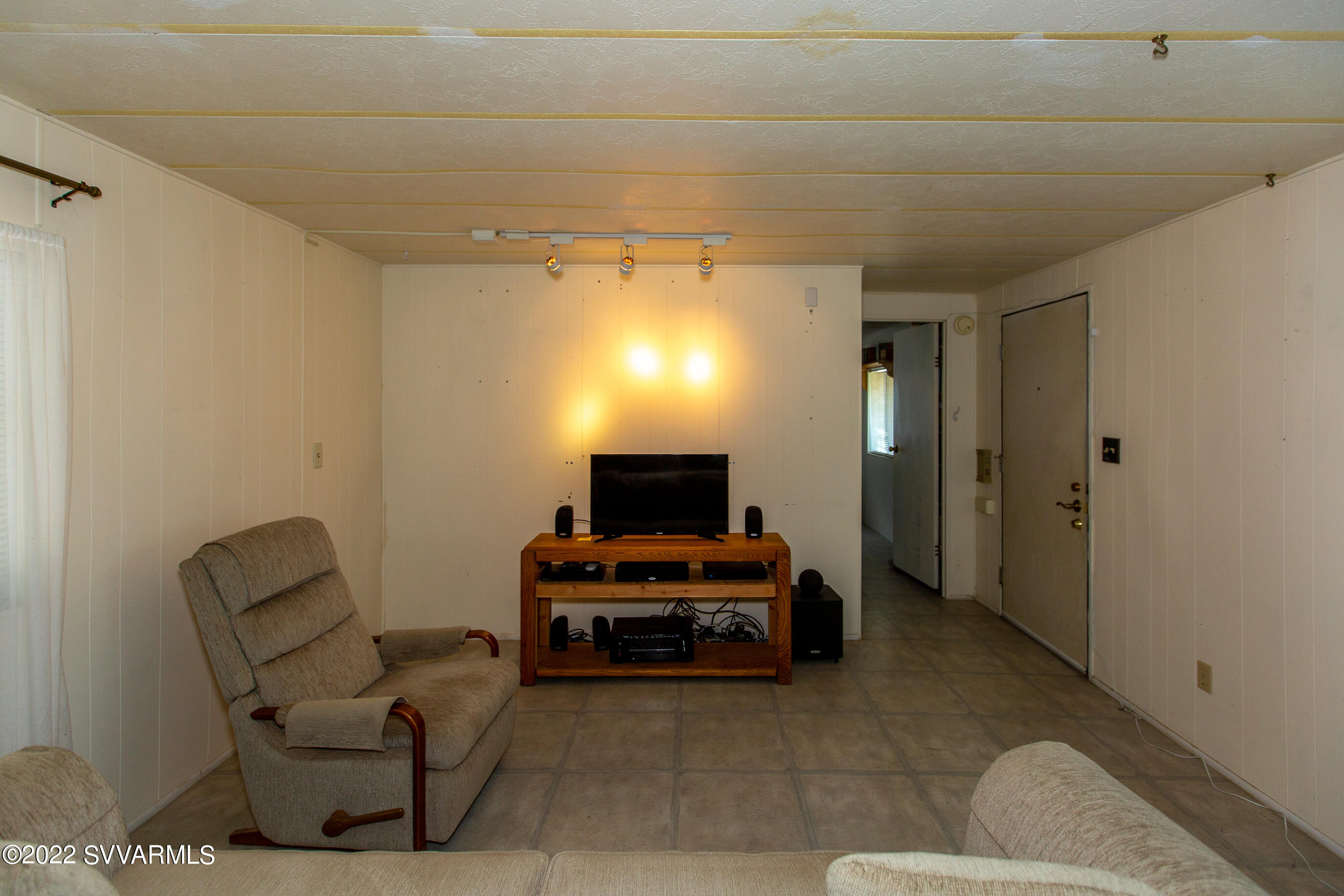 3765 East Valley Vista Road Rimrock, AZ 86335 - Photo 6 of 20 a living room with furniture and a flat screen tv