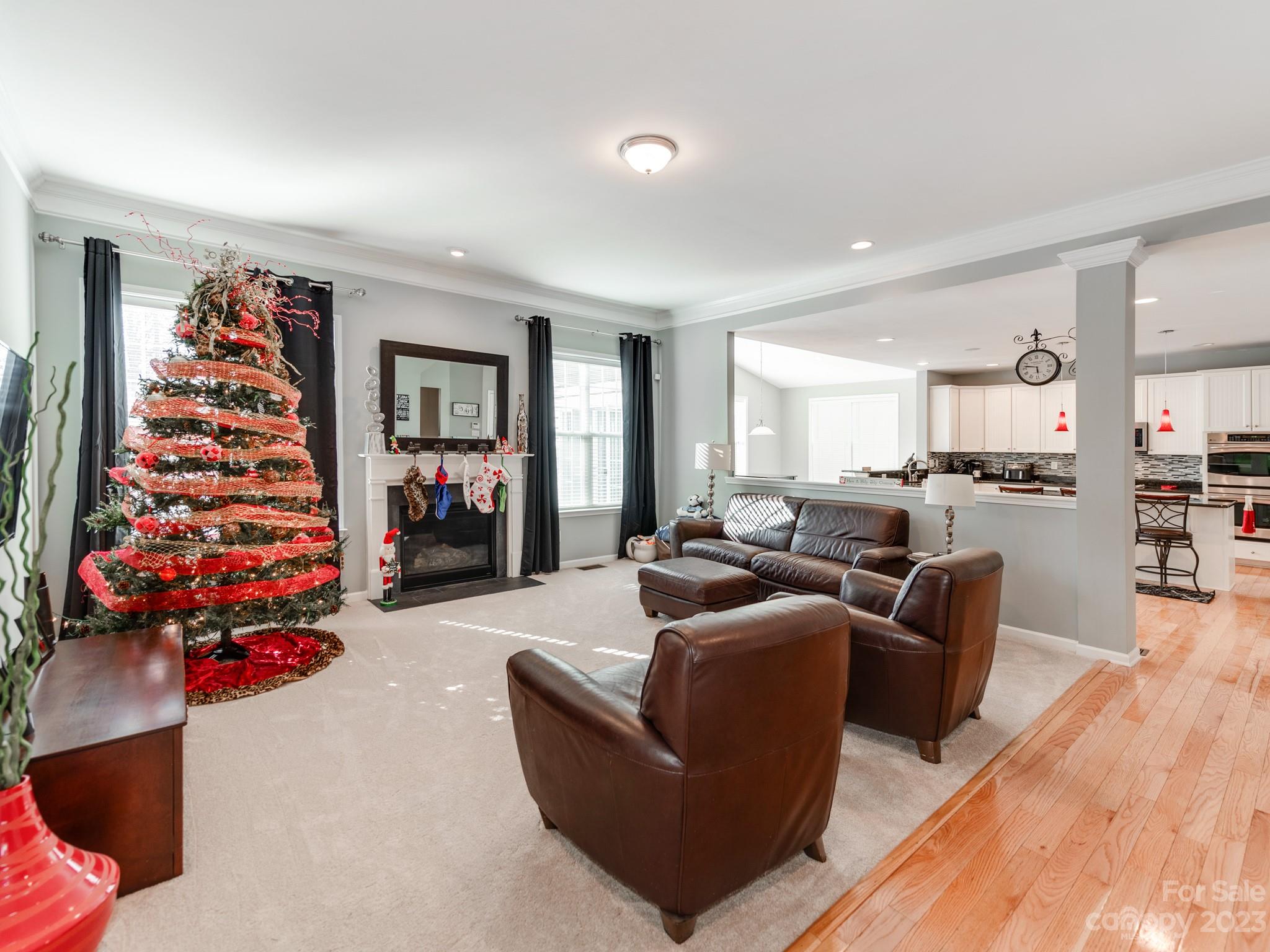 1603 Randwick Way Matthews, NC 28104 - Photo 13 of 48 a living room with furniture and a flat screen tv