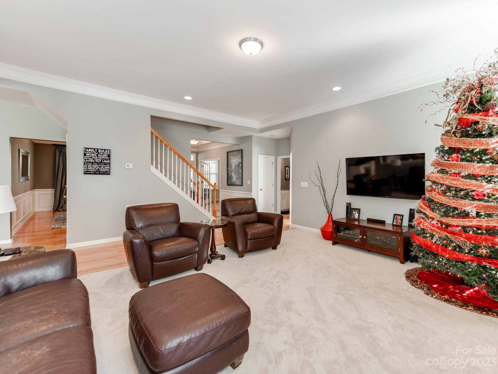 1603 Randwick Way Matthews, NC 28104 - Photo 15 of 48 a living room with furniture and a flat screen tv