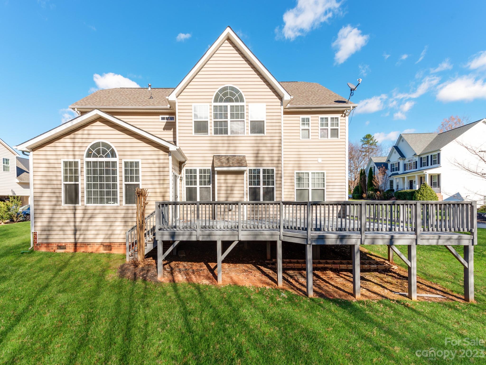 1603 Randwick Way Matthews, NC 28104 - Photo 2 of 48 a view of a house with a backyard