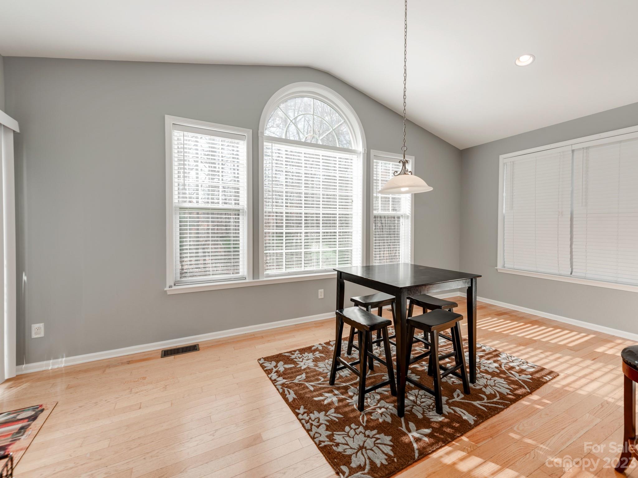 1603 Randwick Way Matthews, NC 28104 - Photo 22 of 48 a view of a dining room with furniture and a window