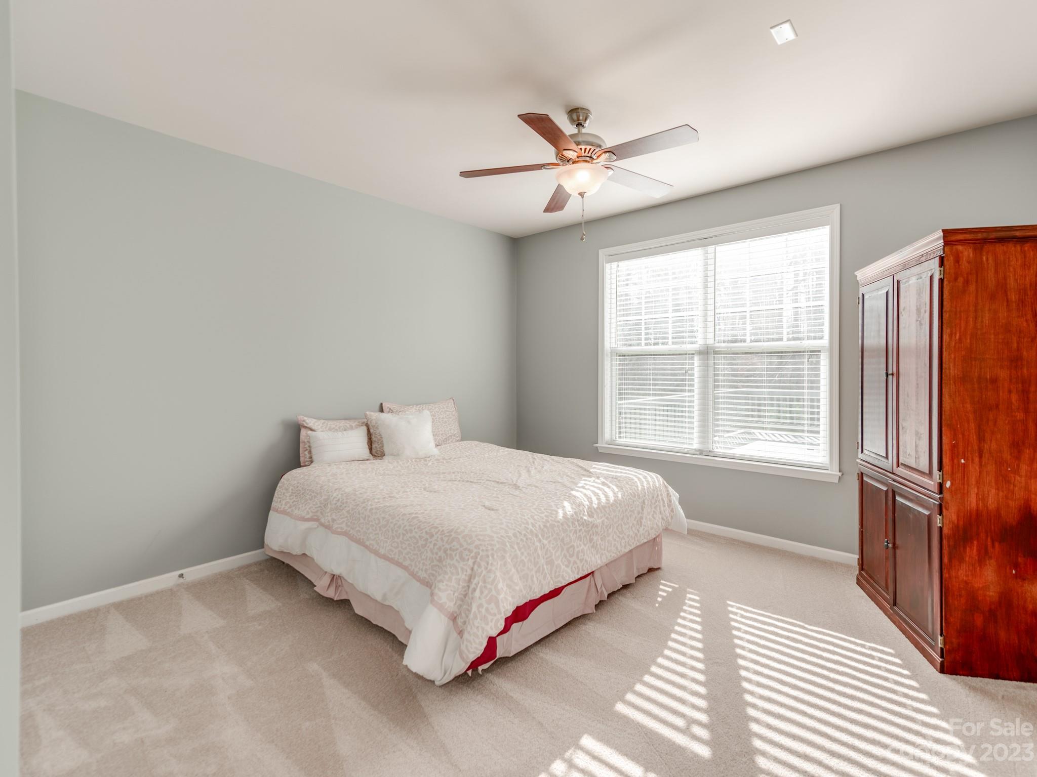 1603 Randwick Way Matthews, NC 28104 - Photo 24 of 48 a bedroom with a bed and a window