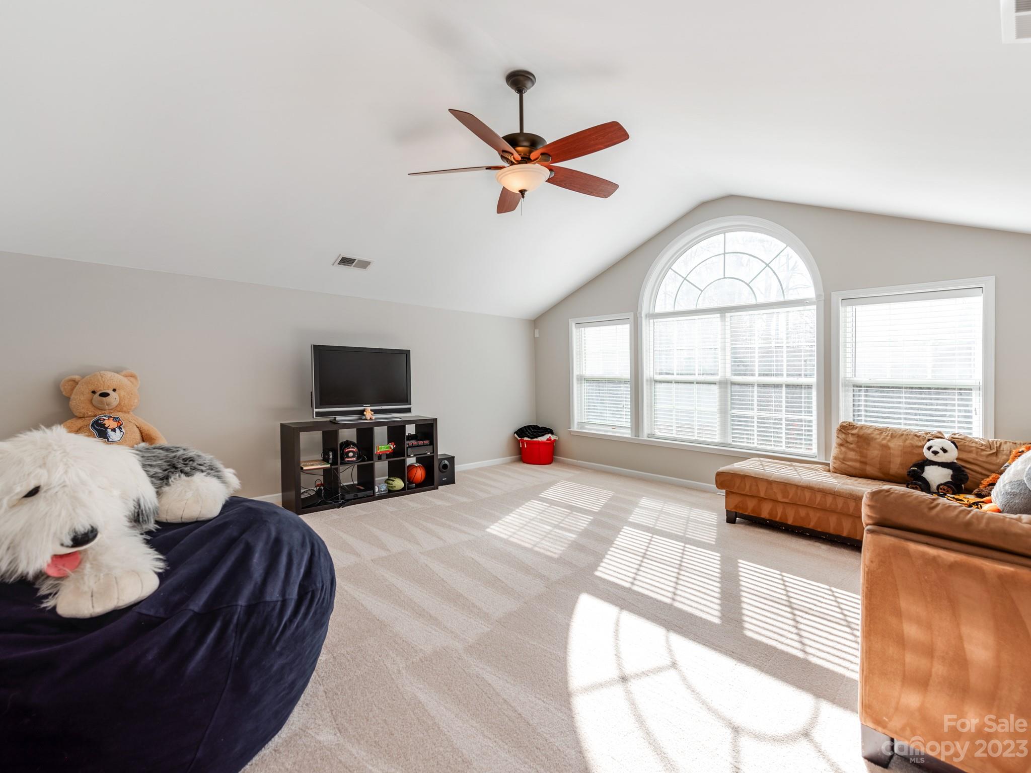 1603 Randwick Way Matthews, NC 28104 - Photo 38 of 48 a living room with furniture and a large window