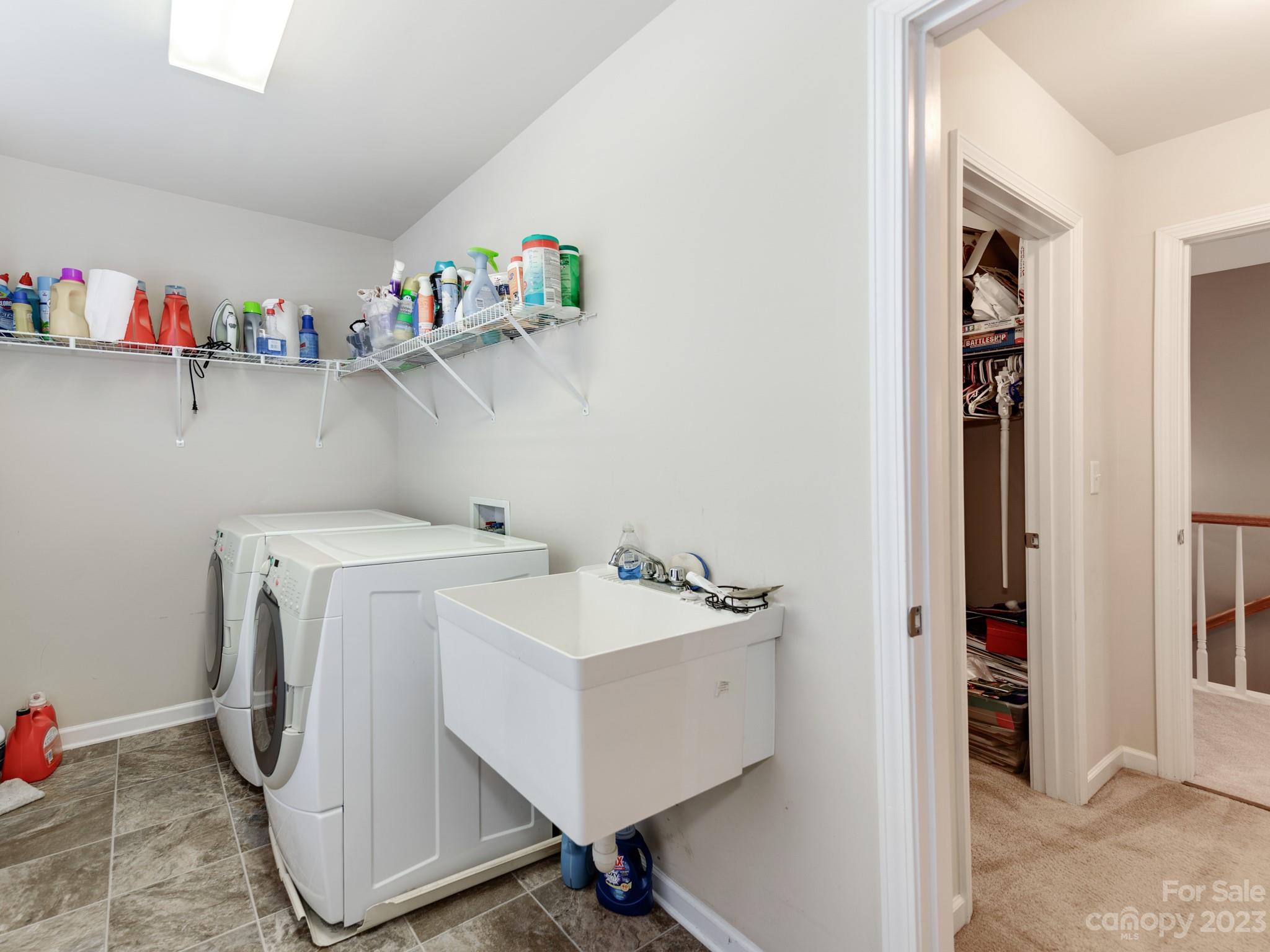 1603 Randwick Way Matthews, NC 28104 - Photo 41 of 48 a utility room with dryer and washer
