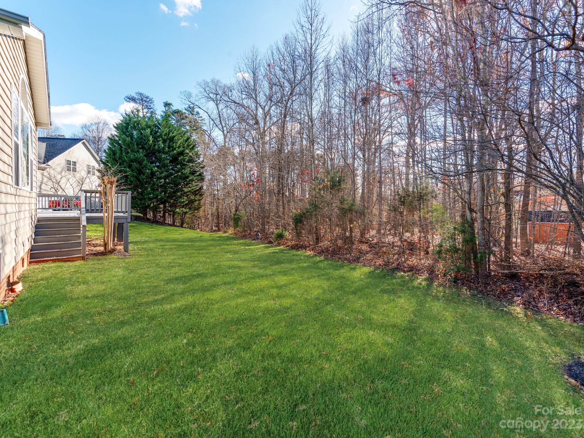 1603 Randwick Way Matthews, NC 28104 - Photo 43 of 48 a view of a house with a yard