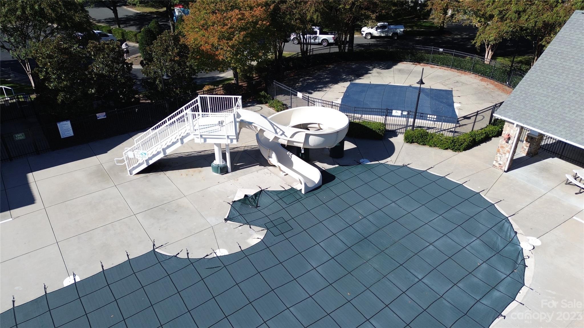 1603 Randwick Way Matthews, NC 28104 - Photo 48 of 48 a view of a patio with couches under an umbrella