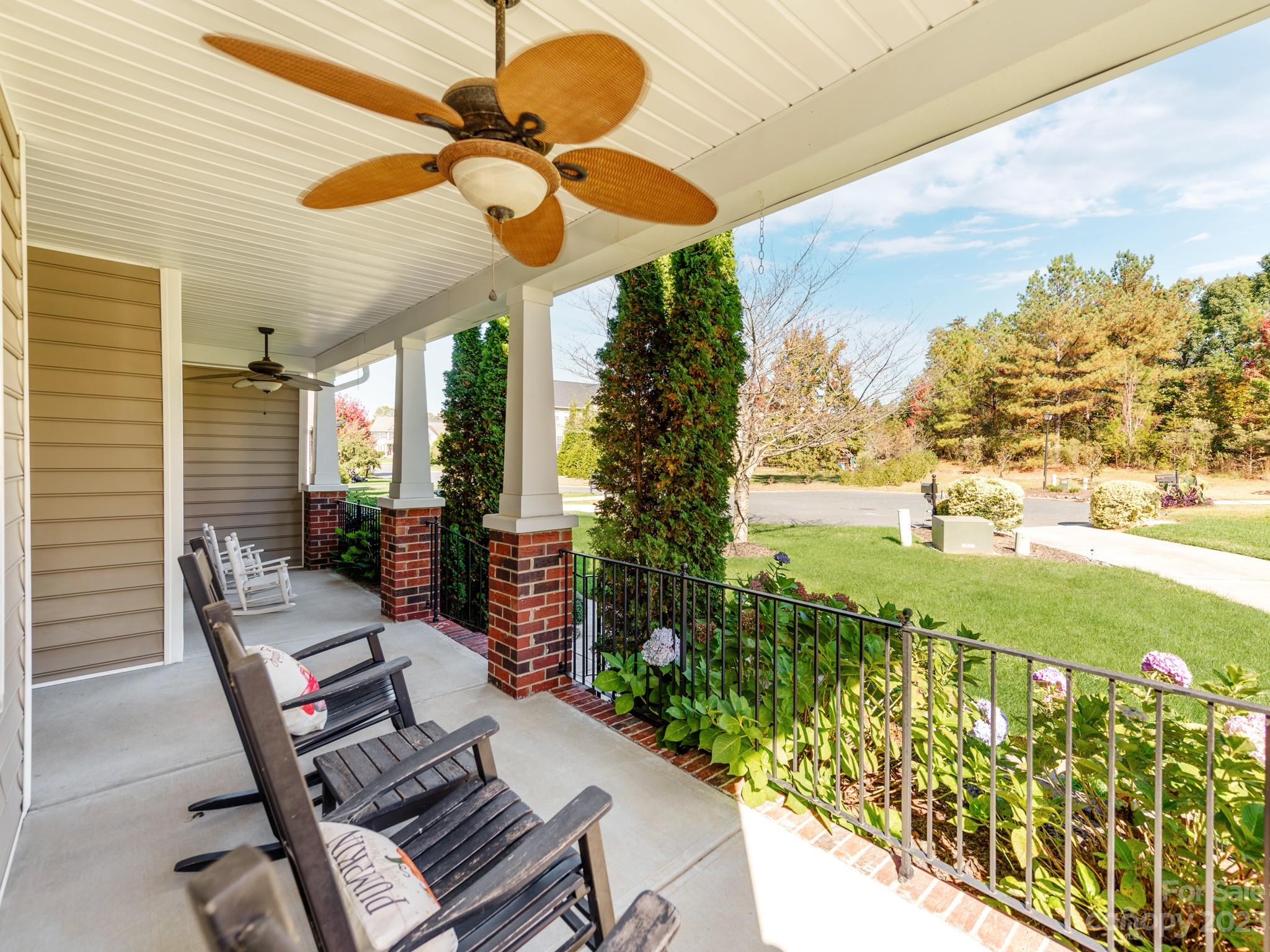 1603 Randwick Way Matthews, NC 28104 - Photo 6 of 48 a view of a porch with furniture and a yard