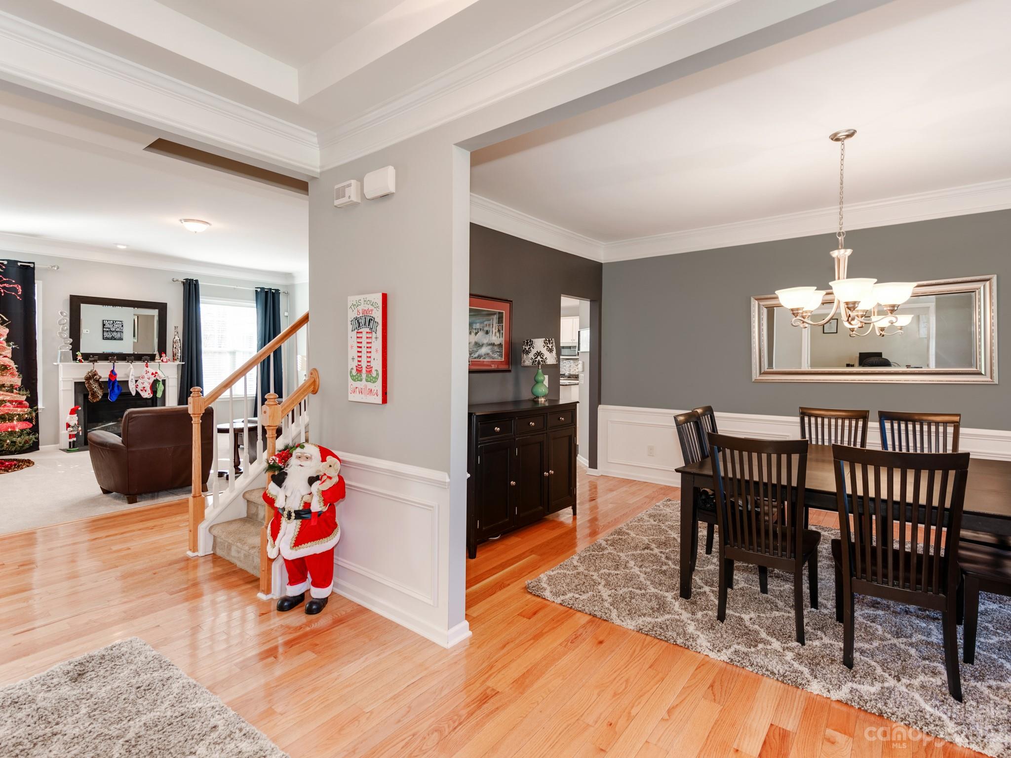 1603 Randwick Way Matthews, NC 28104 - Photo 8 of 48 a view of a dining room with furniture and chandelier